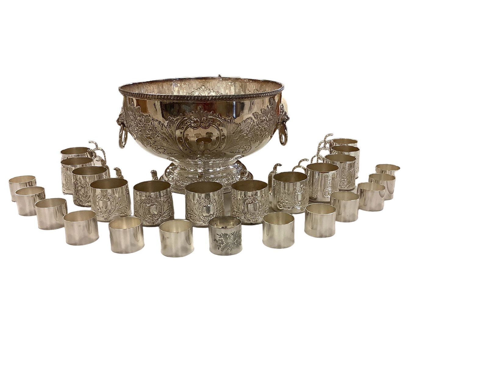 Silver on Copper Punch Bowl & Cups & Silver Plated Napkin Rings: Silver on Copper Punch Bowl & Cups & Silver Plated Napkin Rings 12î diameter punch bowl with (12) cups & (13) napkin rings.