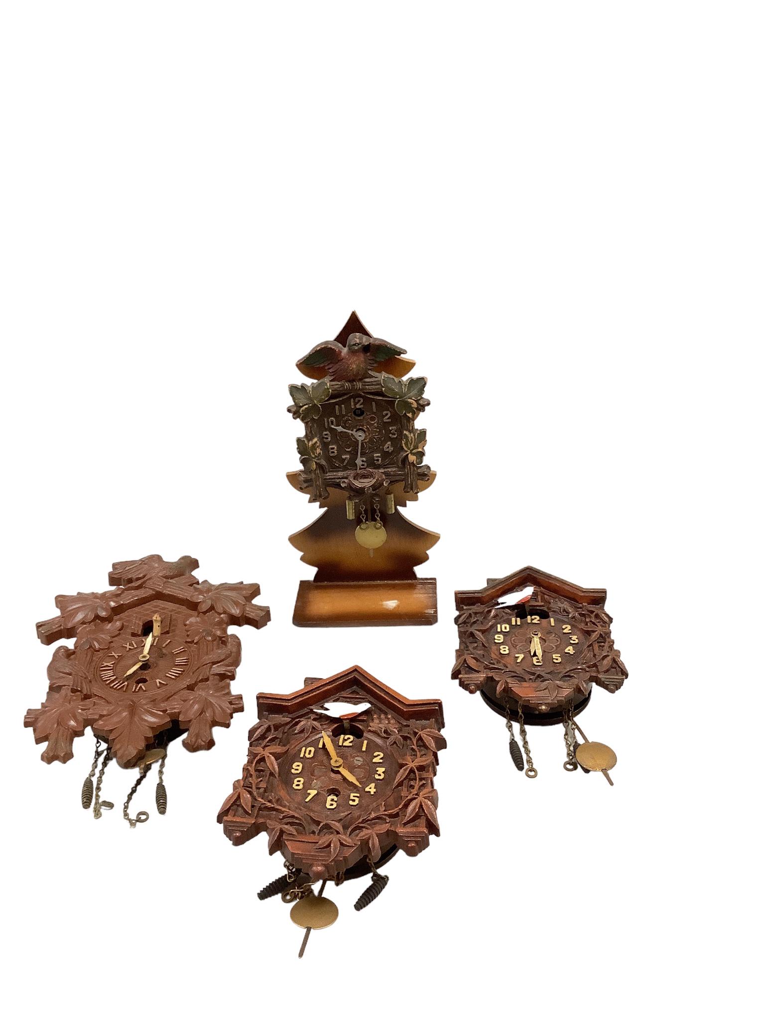 (4) Small Cuckoo Style Clocks by Lux (1 of 1)
