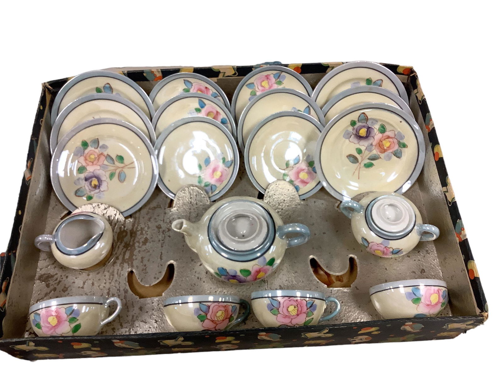 Little Hostess Tea Set in the Original Box: Little Hostess Tea Set in the Original Box (19) pieces. Two cups missing for complete set. Showing some wear.