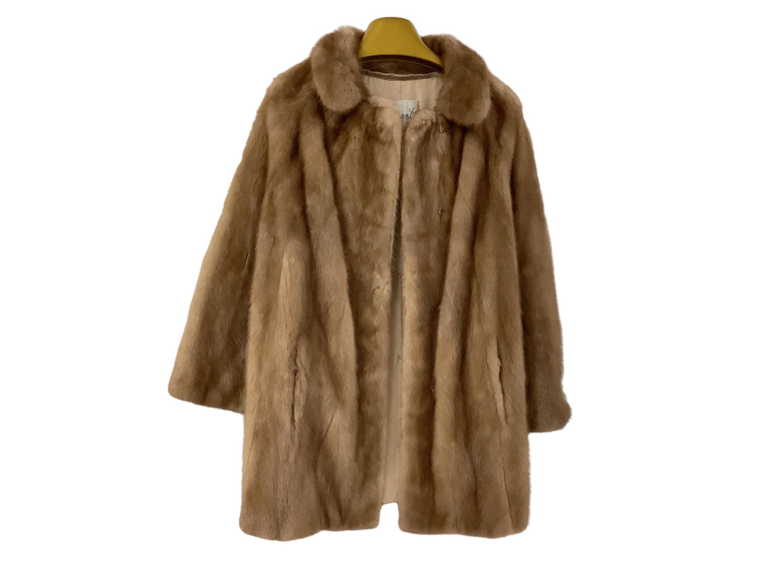 Rich Brown Mink Coat: Rich Brown Mink Coat A pretty brown mink coat made by Kingston Lee furs w/all closures present and lovely satin-type lining in good condition, monogrammed. Coat is approx 30î from back neck seam