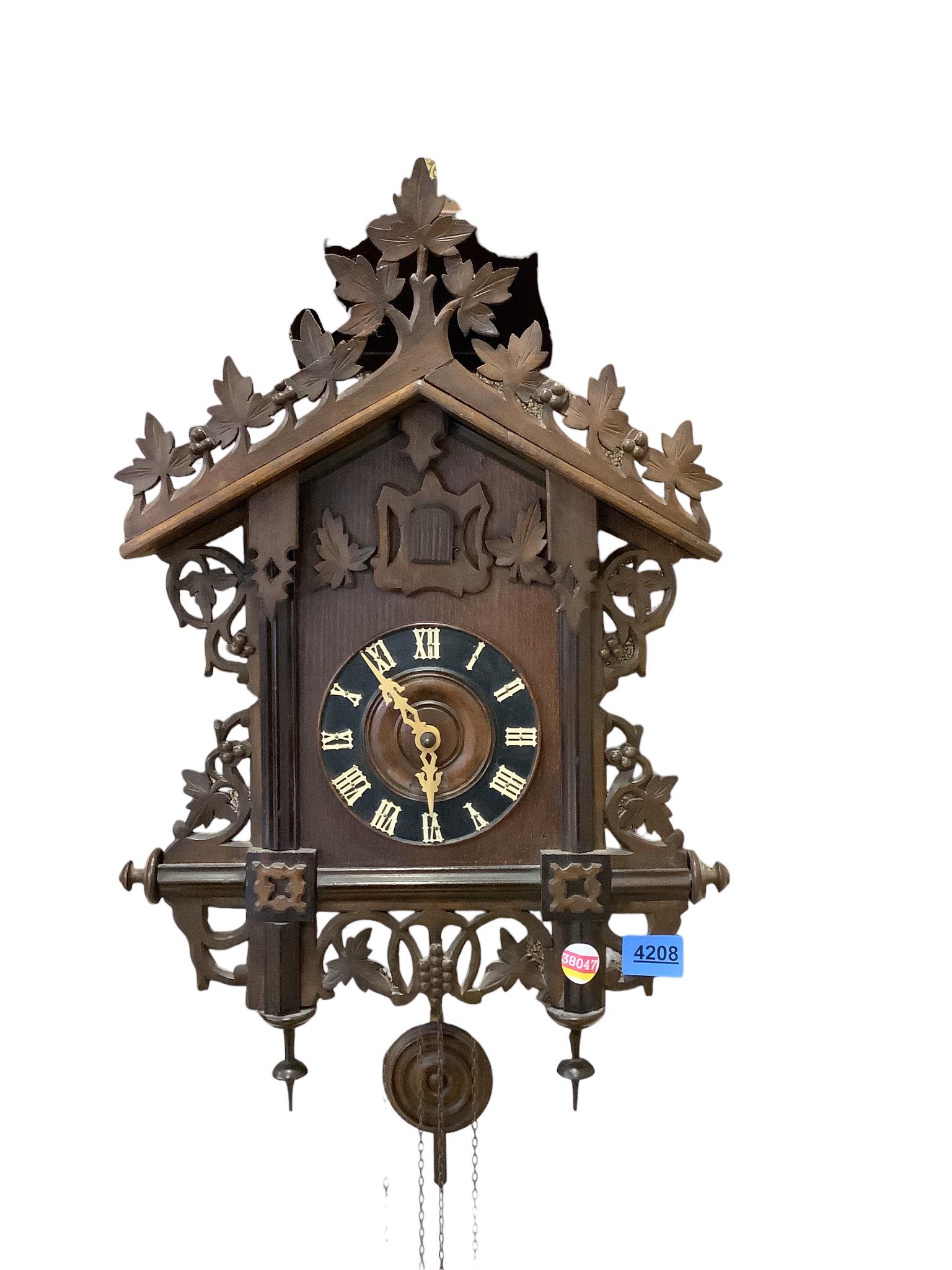 Cuckoo Clock: Cuckoo Clock 15îW x 26î Height of clock without chains and weights.