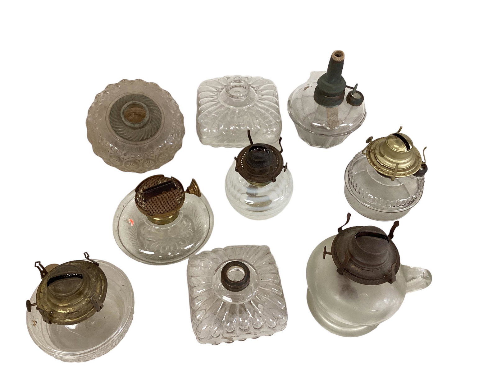 Oil Lamp Bases, Burners: Oil Lamp Bases, Burners 9 glass bases, burners for round, flat, wide wicks. Tallest is 7î.