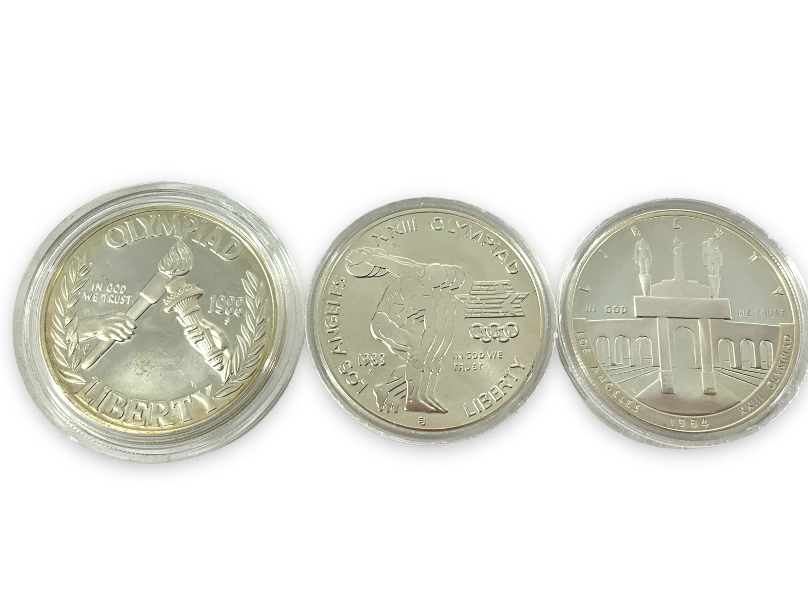 Three U.S. Olympic Commemorative Silver Dollar Coins (1 of 5)