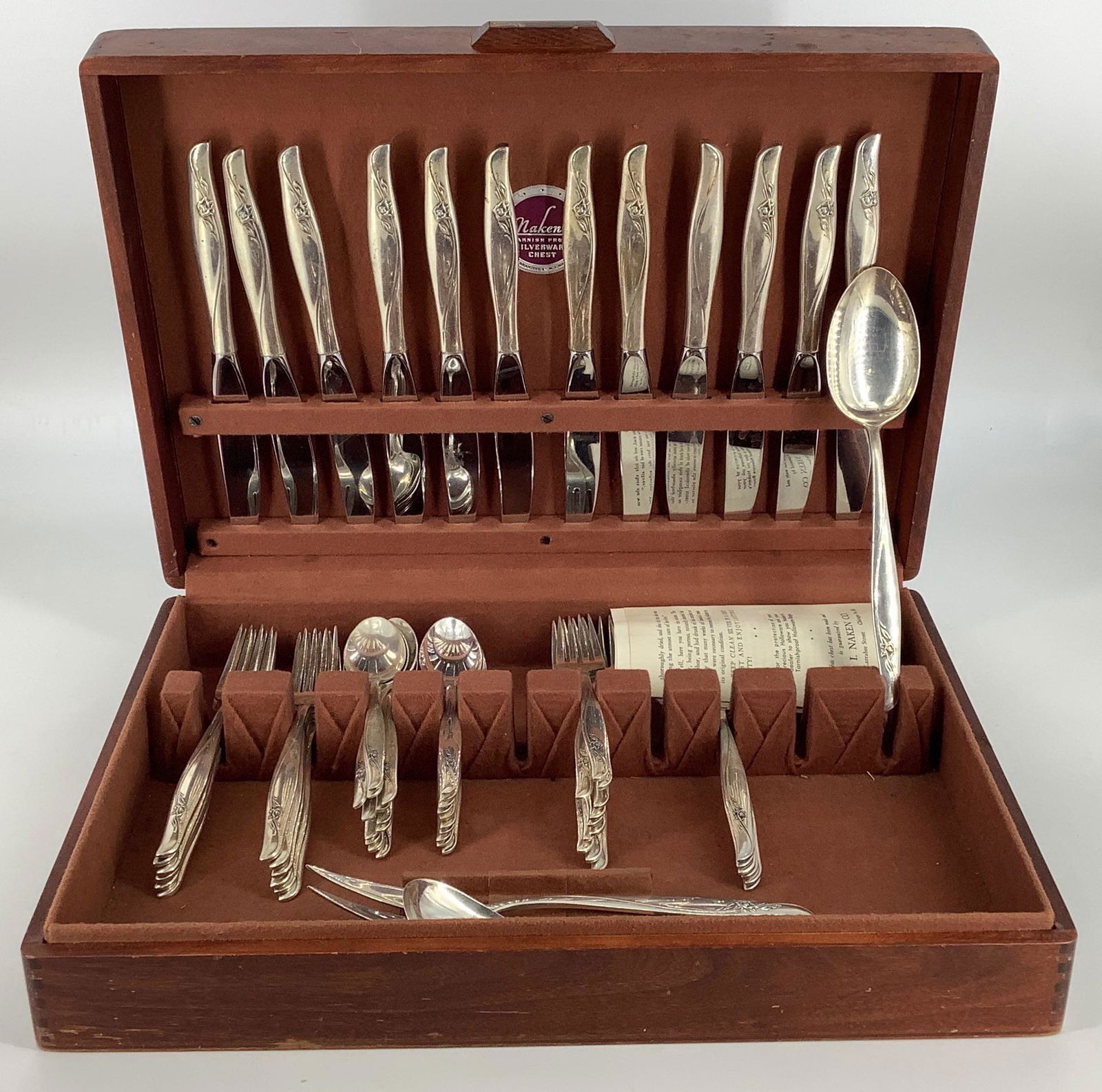 Flatware and Serveware in Chest: Flatware and Serveware in Chest Dinner knives not included in total weight. Approximately 74.45 troy ounces total weight. Gorham Sea Rose pattern. Stamped and tested sterling silver. Includes: 12 dinn