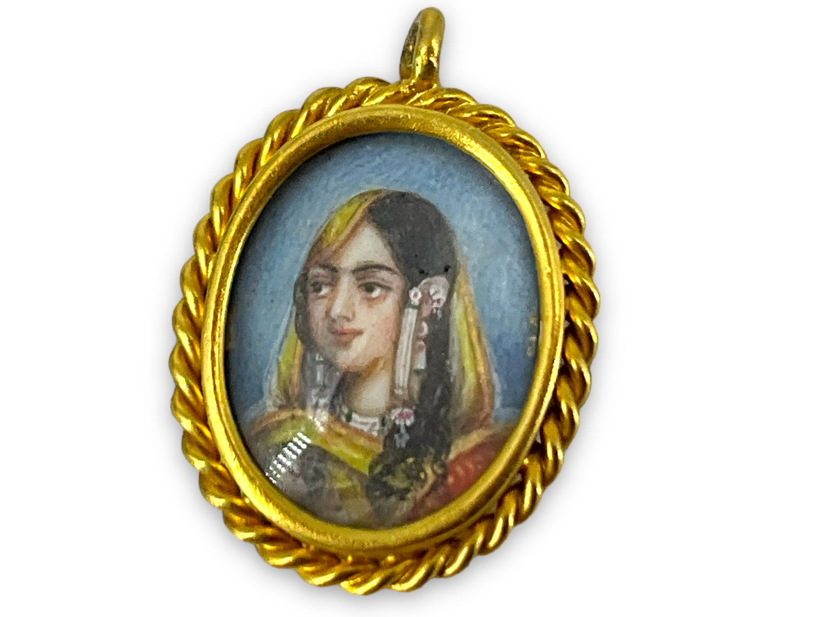 Hand-Painted Portrait Pendant in 18kt Yellow Gold: Hand-Painted Portrait Pendant in 18kt Yellow Gold 17.0mm in size (excluding bail), 1.9 grams total weight, Indian design/origin, rope style edge work around bezel, small bail, no stamps/signatures. Po
