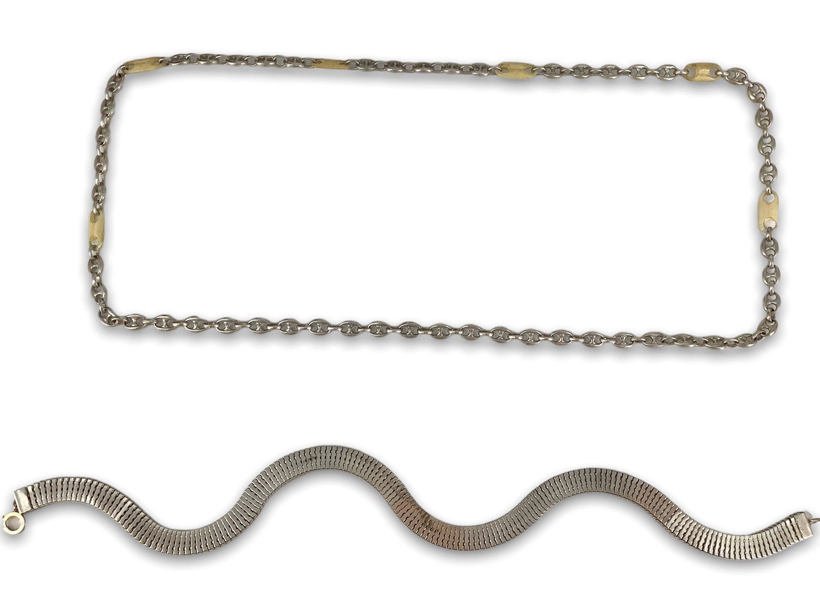 (2) Sterling Silver Necklaces: (2) Sterling Silver Necklaces Including one measuring 16” in length with rectangular links and one measuring 32” in length with Gucci links and bone accent beads, both pieces tested (3.1 t