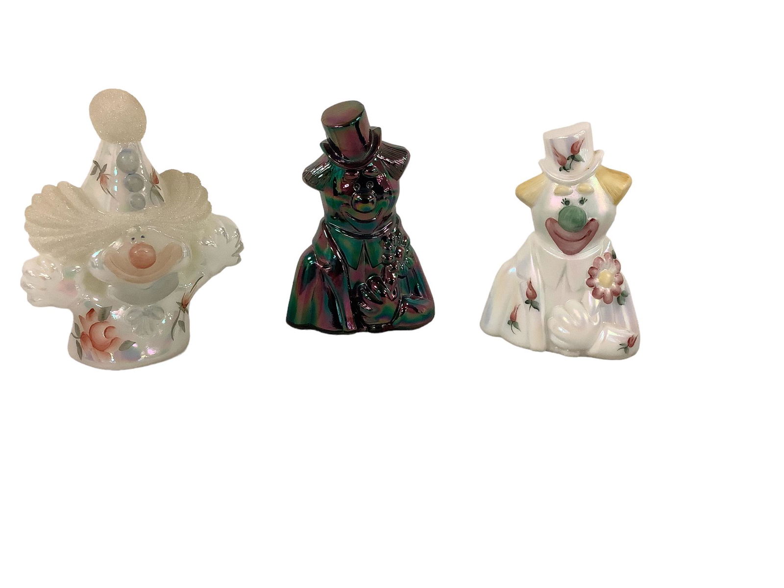 (3) Fenton Clowns: (3) Fenton Clowns (2) hand painted and 1 carnival glass. Range from 4.25î - 4.5î tall.