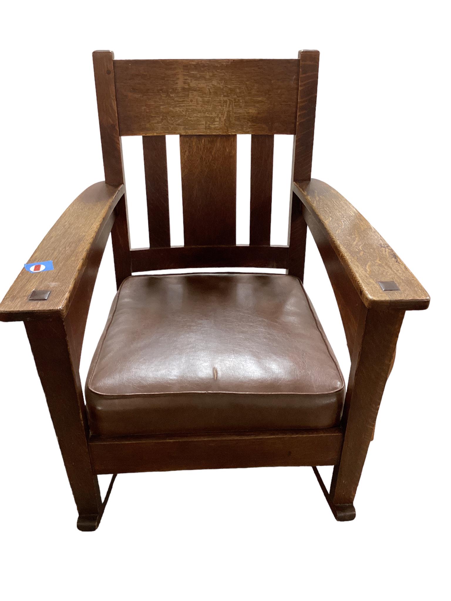 Mission Oak Rocking Chair: Mission Oak Rocking Chair Rocking chair measuring 33î H in the back. There is a split in the cushion in front.