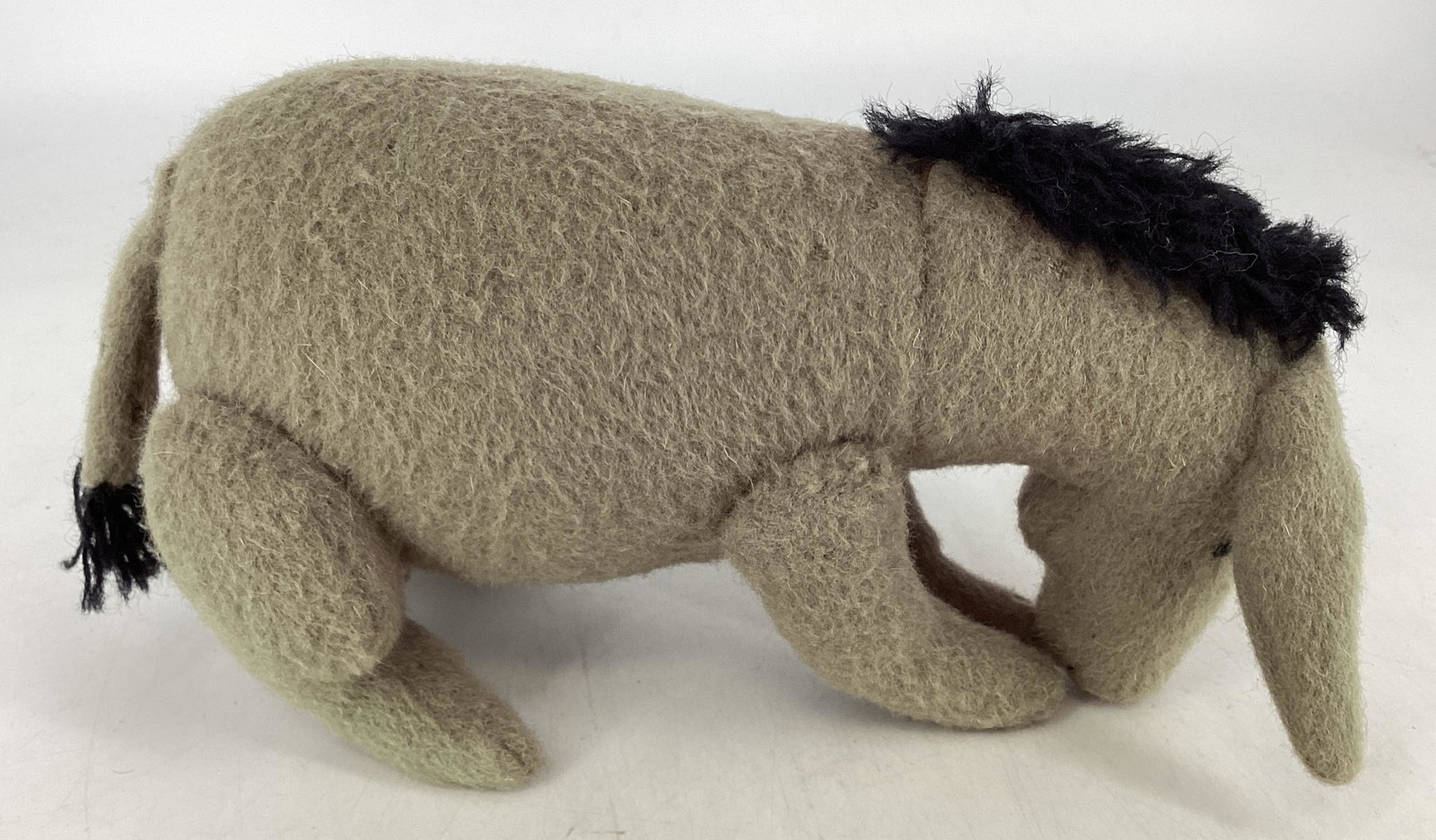 R. John Wright "Pocket Eeyore": R. John Wright "Pocket Eeyore" 10" L x 6 1/4" H. From the "Pocket Series". No box or COA.