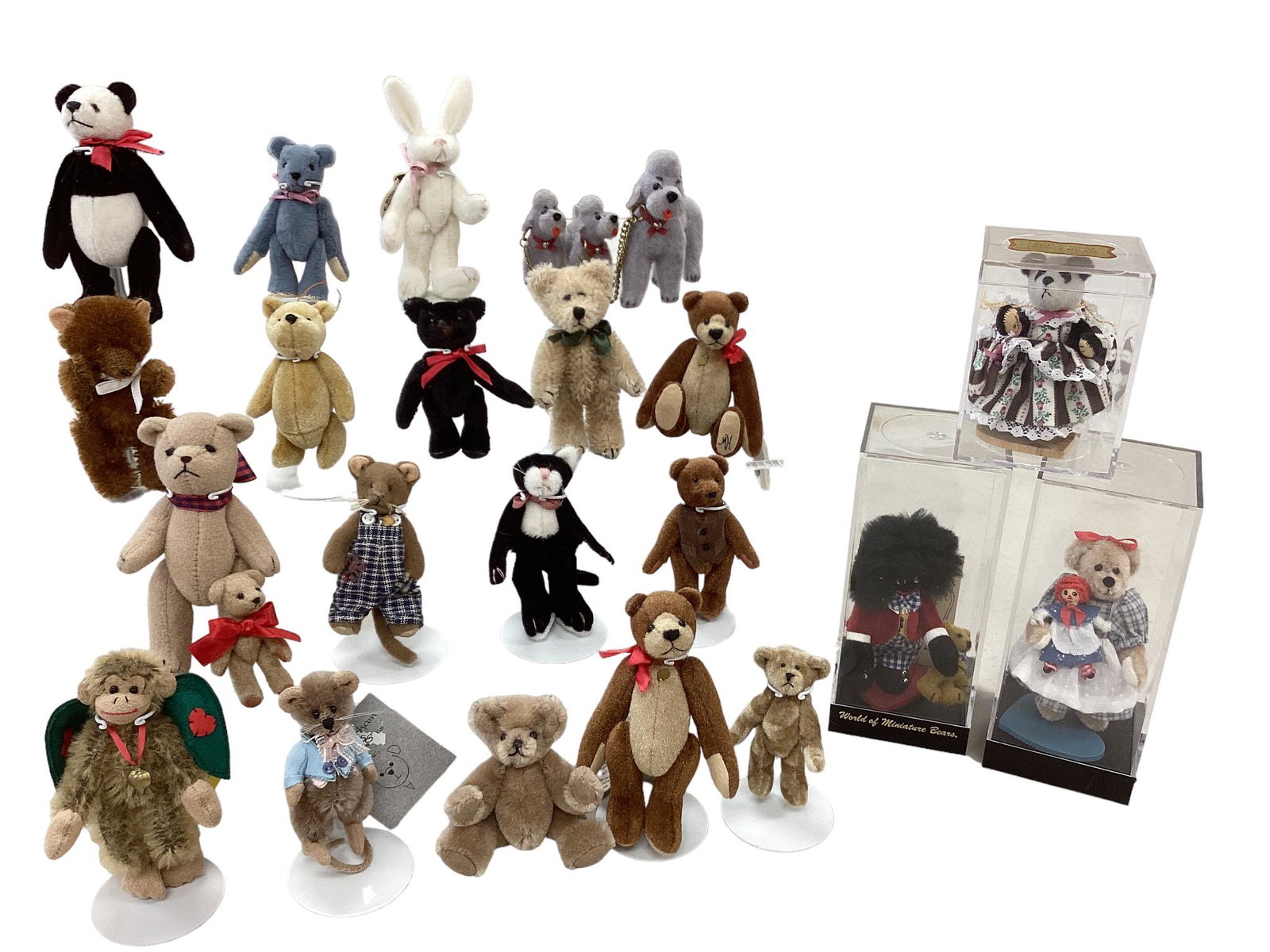 21 Miniature Animals: 21 Miniature Animals Some in original case, bears, monkey with wings, dogs, more.