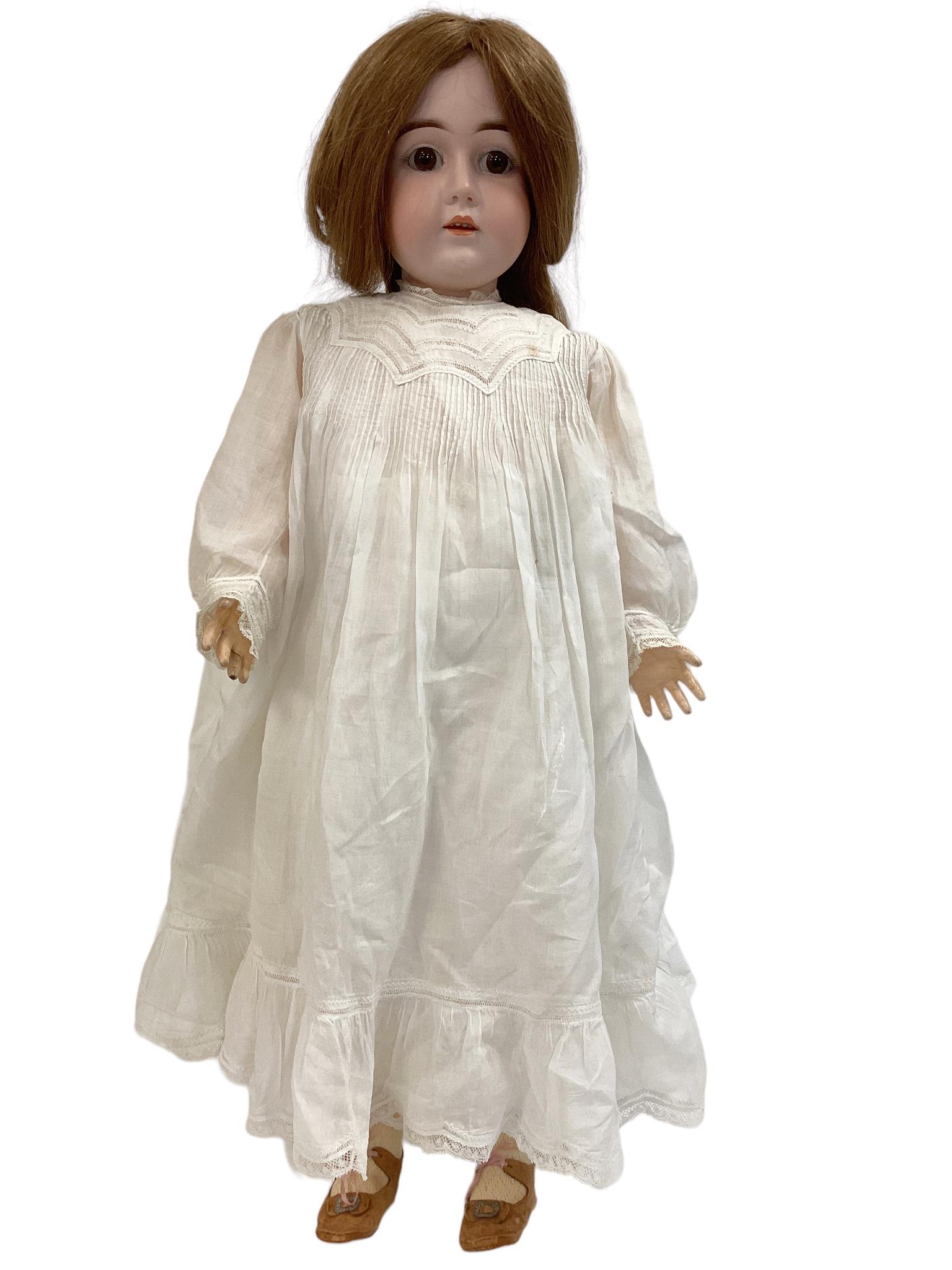 Kestner Bisque Socket Head Girl: Kestner Bisque Socket Head Girl 26 1/2" doll with human hair wig, set glass eyes, open mouth with teeth, on jointed composition body. Wig and pate glued on and not removed for inspection.