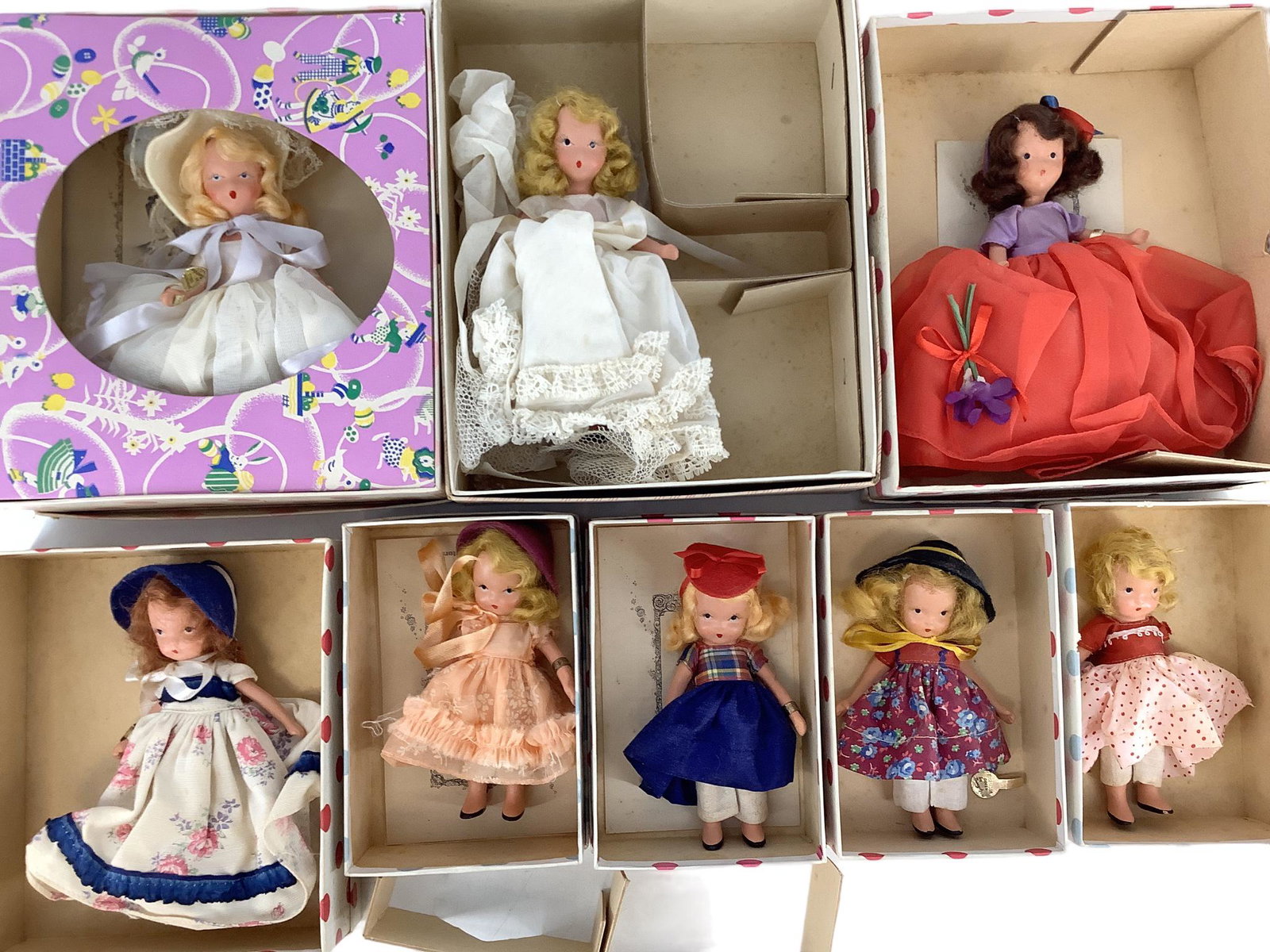 (7) Nancy Ann Storybook Dolls & (1) Melody Doll: (7) Nancy Ann Storybook Dolls & (1) Melody Doll Includes: Melody Doll Bride, ìA January Merry Maid for New Year 187î, ìIn My Easter Bonnetî, ìGoldilocksî, ìOver the 