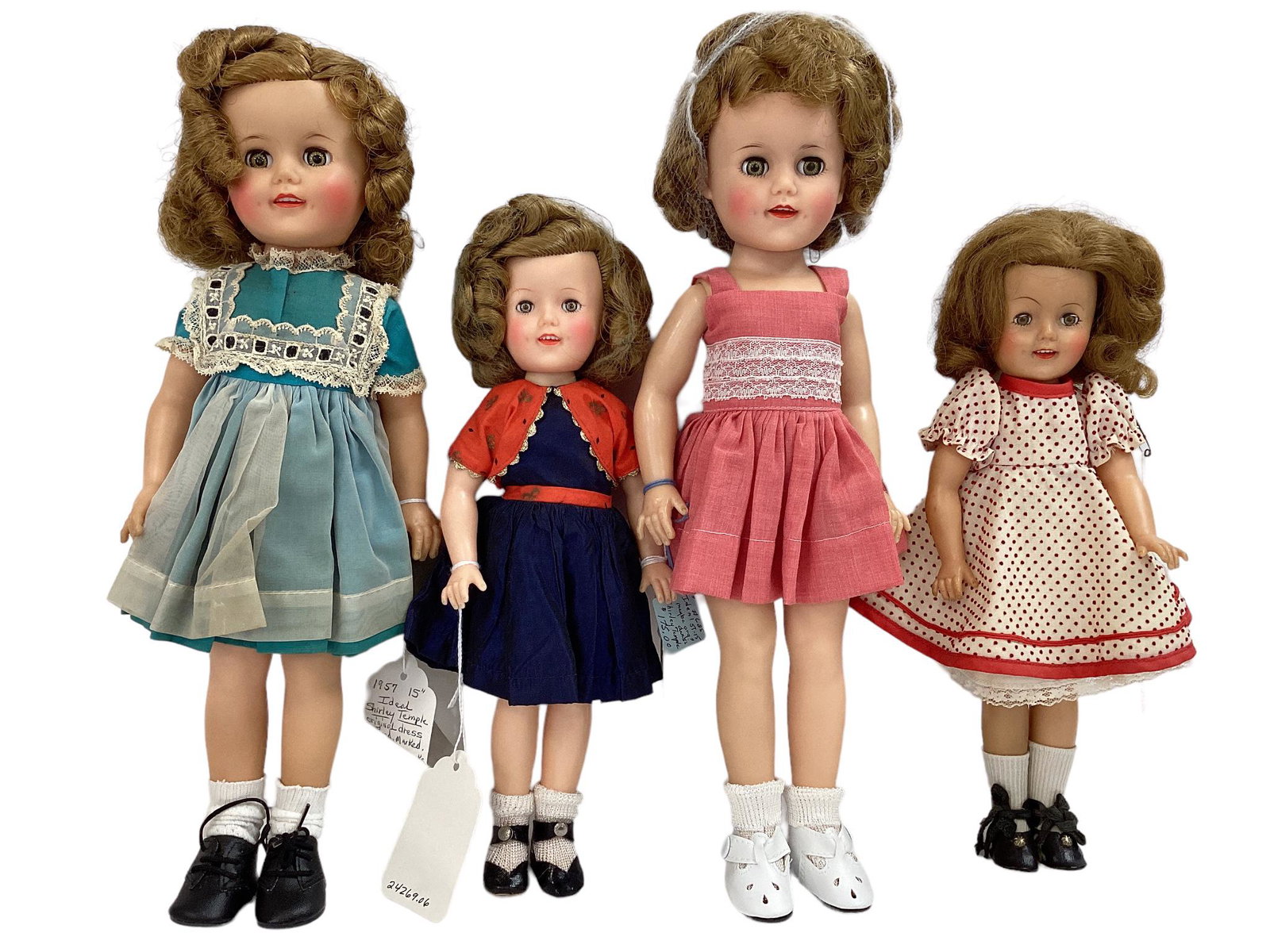 (4) Ideal Vinyl Shirley Temple Dolls: (4) Ideal Vinyl Shirley Temple Dolls Includes (2) 15" dolls and (2) 12" dolls. All have rooted hair, sleep eyes, open/closed mouths with teeth, five-piece bodies. Turquoise dress and navy dress are ta