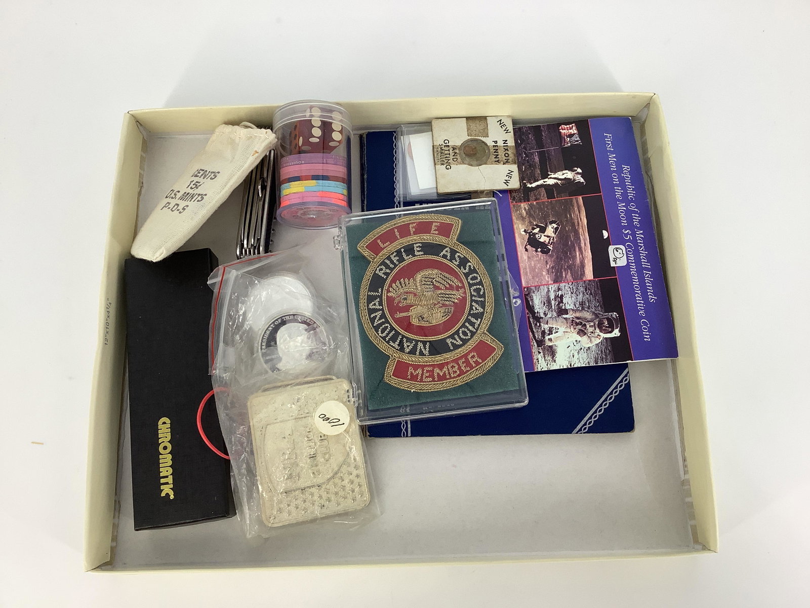 Lot Of Coins & Miscellaneous Items: Lot Of Coins & Miscellaneous Items Lot includes: 1 1940 S Nickel Plated Rainbow Toned Lincoln Cent, 1 blank planchette Lincoln cent, 1 tube of dice and casino tokens, 1 Nixon Penny, 1 National Rifle A