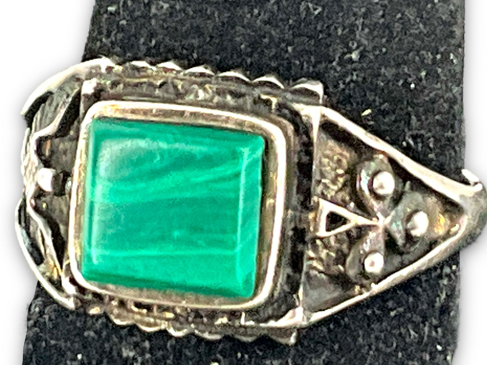 Sterling and Malachite Stone Ring: Sterling and Malachite Stone Ring Sterling and malachite stone ring, size 12.5, 0.19 troy ounces total weight, tapered shank, with 9.0mm malachite stone cabochon at center.