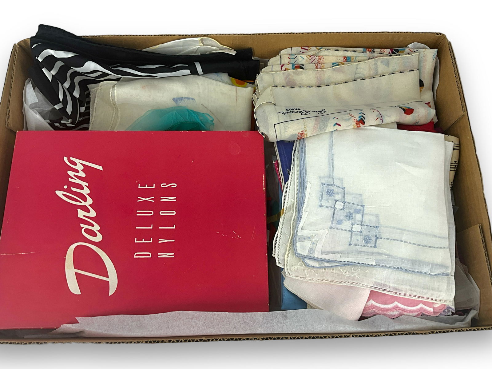 Vintage Stockings, Scarves and Handkerchiefs: Vintage Stockings, Scarves and Handkerchiefs In the original box are a pair of ìDarling Deluxe Nylonsî with garters and a certificate of warranty from 1958. Also included are hose in origina