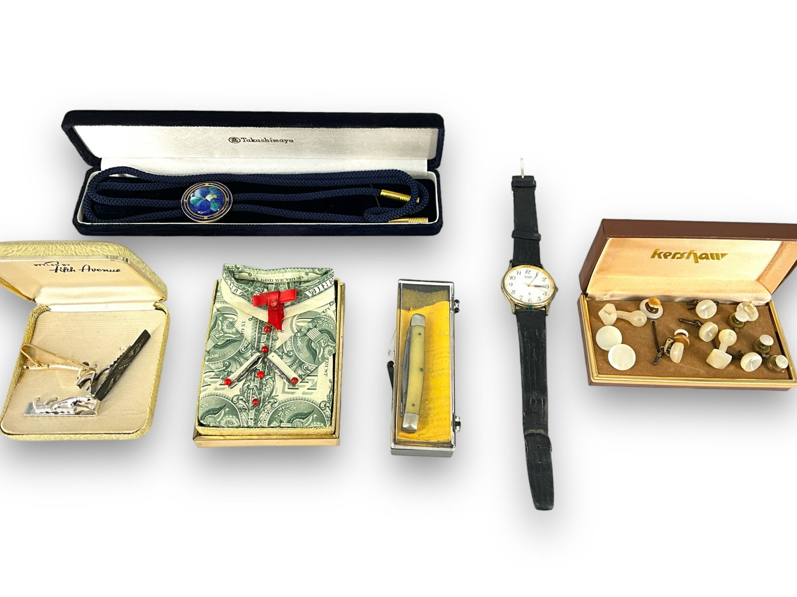Darling Holiday ìMoney Shirtî, Navy Color Bolo Necklace, Tie Clasps, Vintage MOP Cufflinks: Darling Holiday ìMoney Shirtî, Navy Color Bolo Necklace, Tie Clasps, Vintage MOP Cufflinks and Studs Genuine dollar bills are folded and pinned into the shape of a button-down shirt and set 