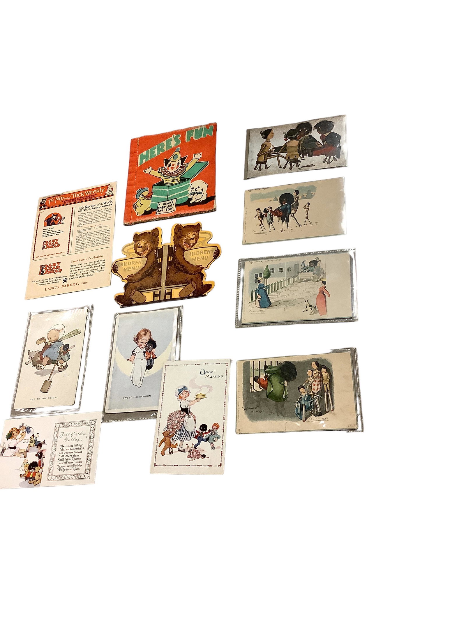 (11) Golliwog Themed Postcards & Ephemera: (11) Golliwog Themed Postcards & Ephemera (4) Florence Upton Golliwog postcards, circa 1904 & 1912. (4) Golliwog postcards circa 1922, 1920 and 1933. Deans soft rag book circa 1950. Union pacific rail