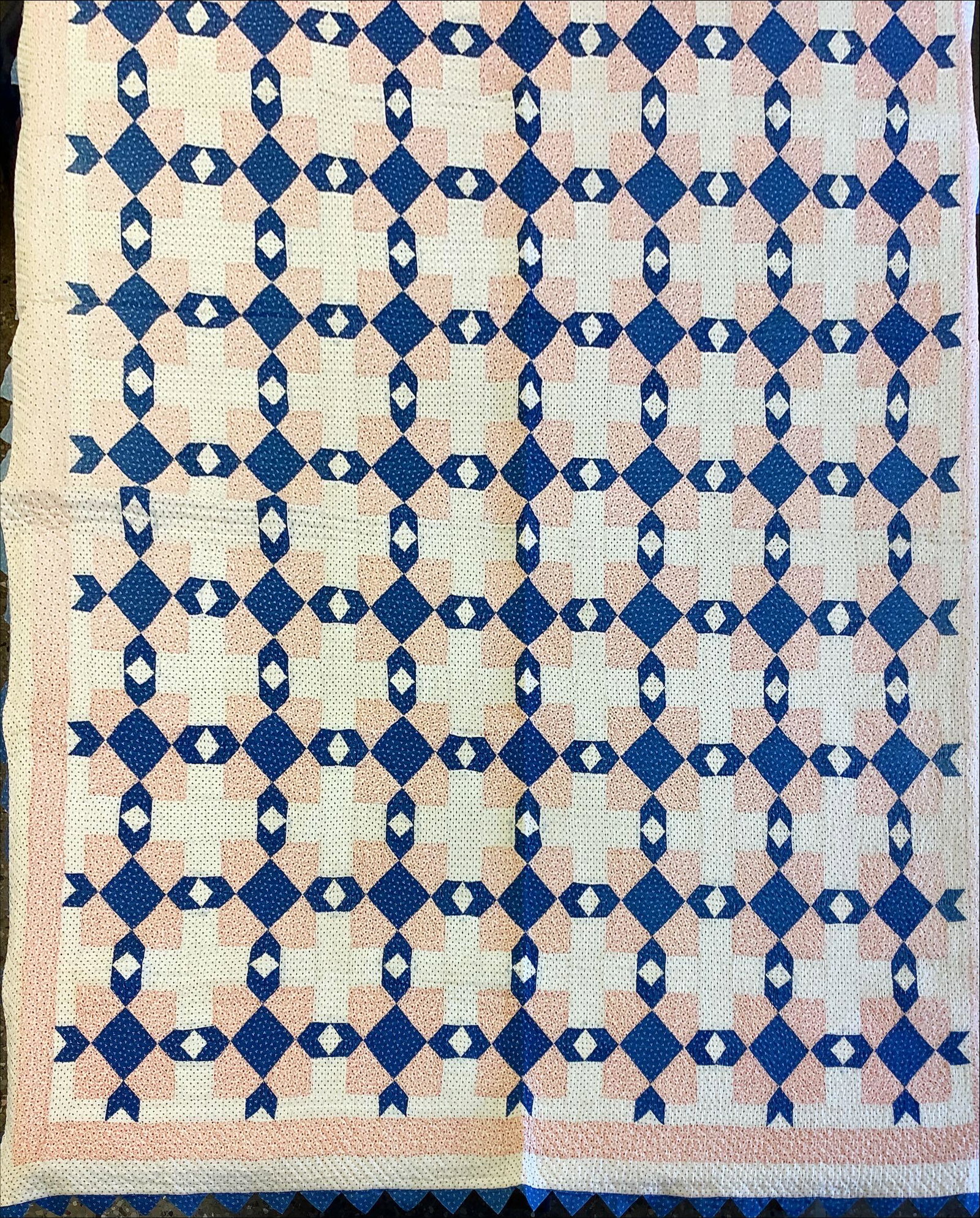 Blue and Pink Quilt: Blue and Pink Quilt 69î x 81î, blue triangular border on four sides. No visible spots or tears.
