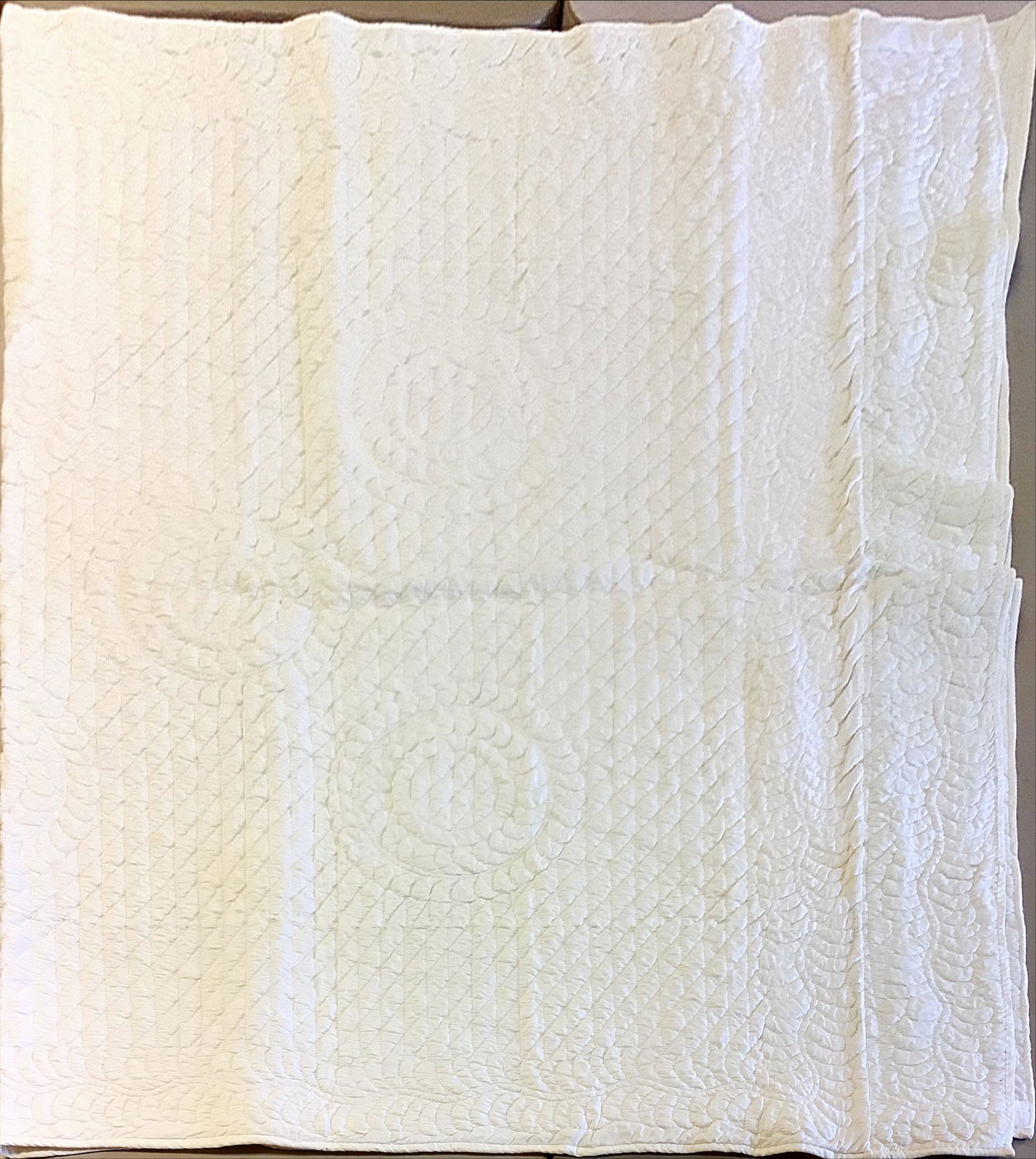 Quilt: Quilt All white with ì1972î embroidered on edge, 66î x 104î. No visible spots or tears.