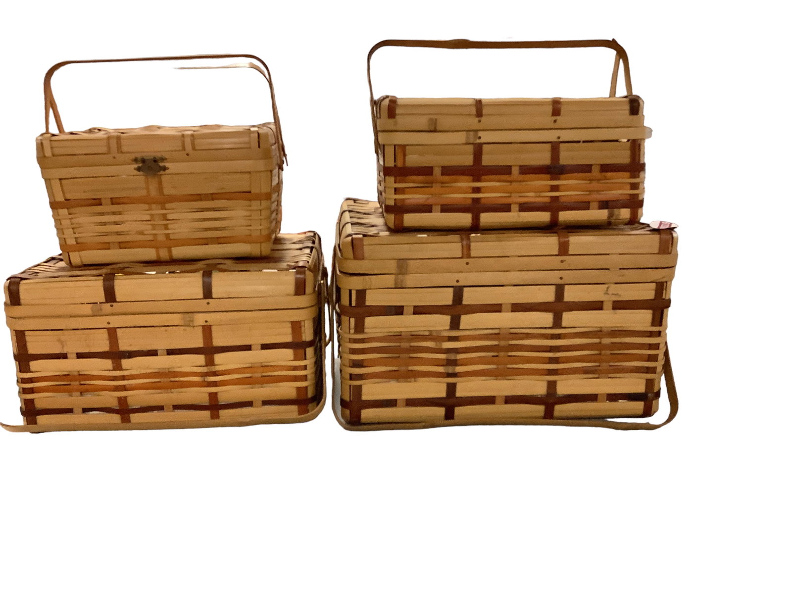 Set of (4) Rattan Baskets: Set of (4) Rattan Baskets (3) are nesting. Largest measures 12 x 10 x 7
