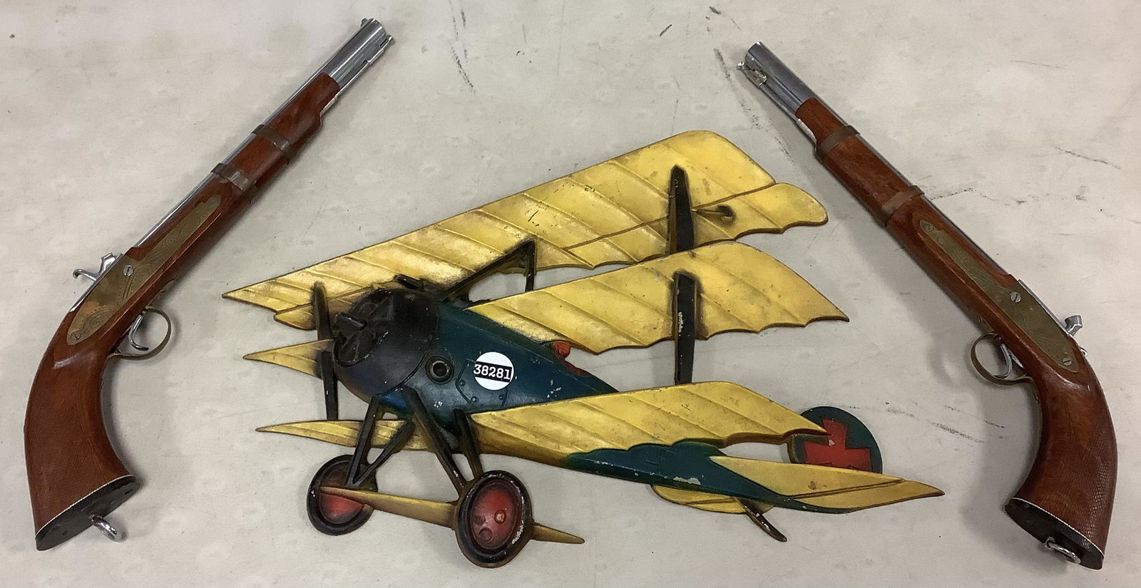 Vintage Toy Pistols & Airplane Wall Decor (1 of 1)