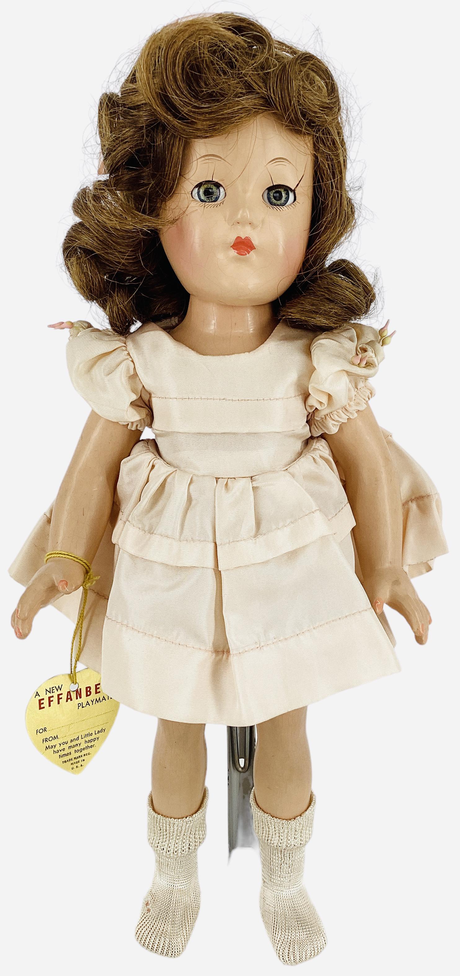 Effanbee "Little Lady": Effanbee "Little Lady" 15" composition doll with human hair wig in original set, sleep eyes, closed mouth, on five-piece body. Doll wears her original dress with matching underpants. Splits at both ey