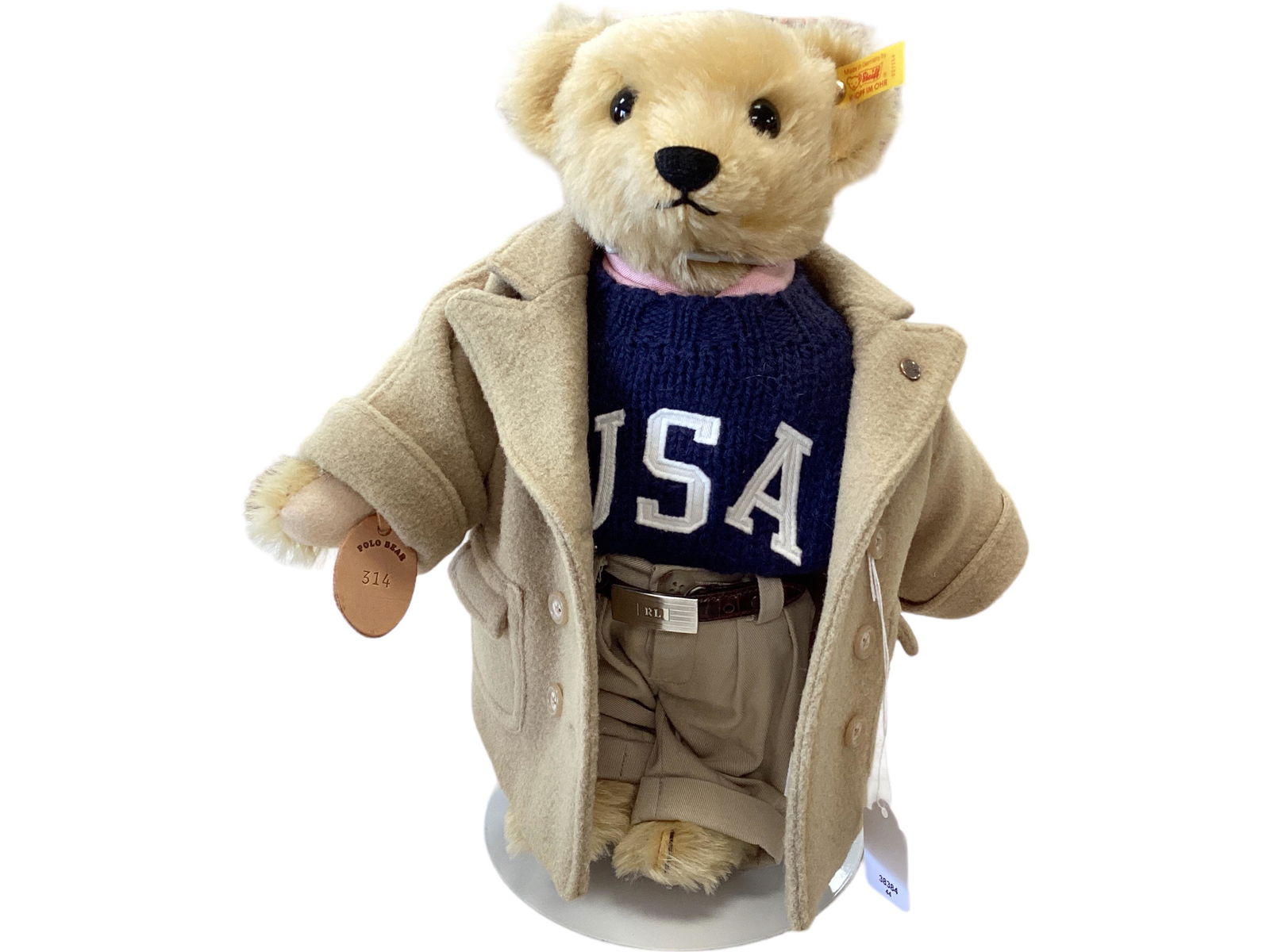 Steiff Ralph Lauren Polo Bear: Steiff Ralph Lauren Polo Bear 13" gold mohair bear with stitched nose and mouth, disk jointed neck, shoulders and hips. Bear is dressed in Ralph Lauren pink oxford shirt, tie, slacks, belt, USA sweate