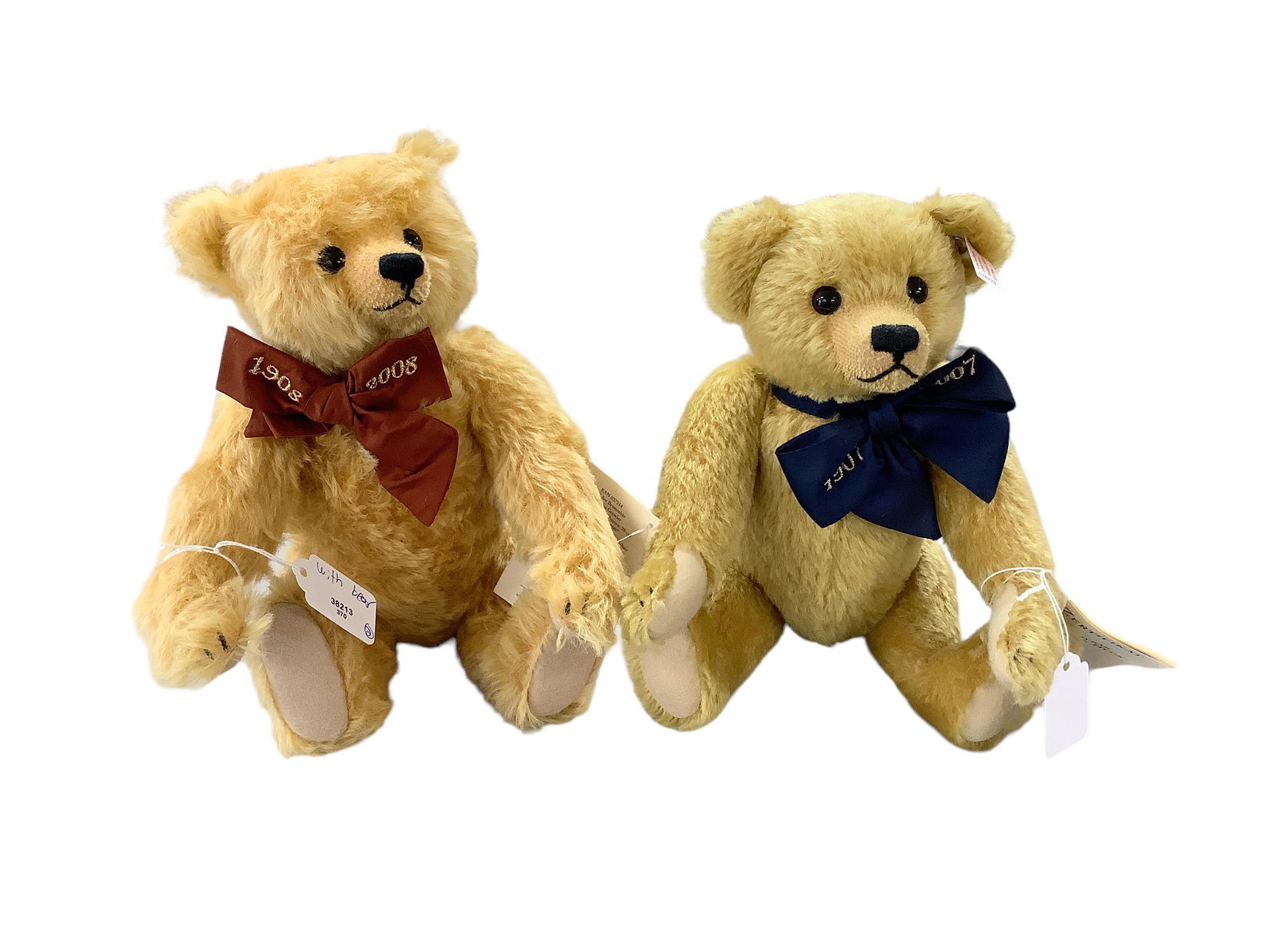 (2) Steiff Bears, ìPaul the Growlerî & ìA Million Hugsî: (2) Steiff Bears, ìPaul the Growlerî & ìA Million Hugsî Paul is golden brown, #01875/ 3000 with growler. Bow embroidered with 1908-2008 to celebrate the 2008 anniversary of the gro