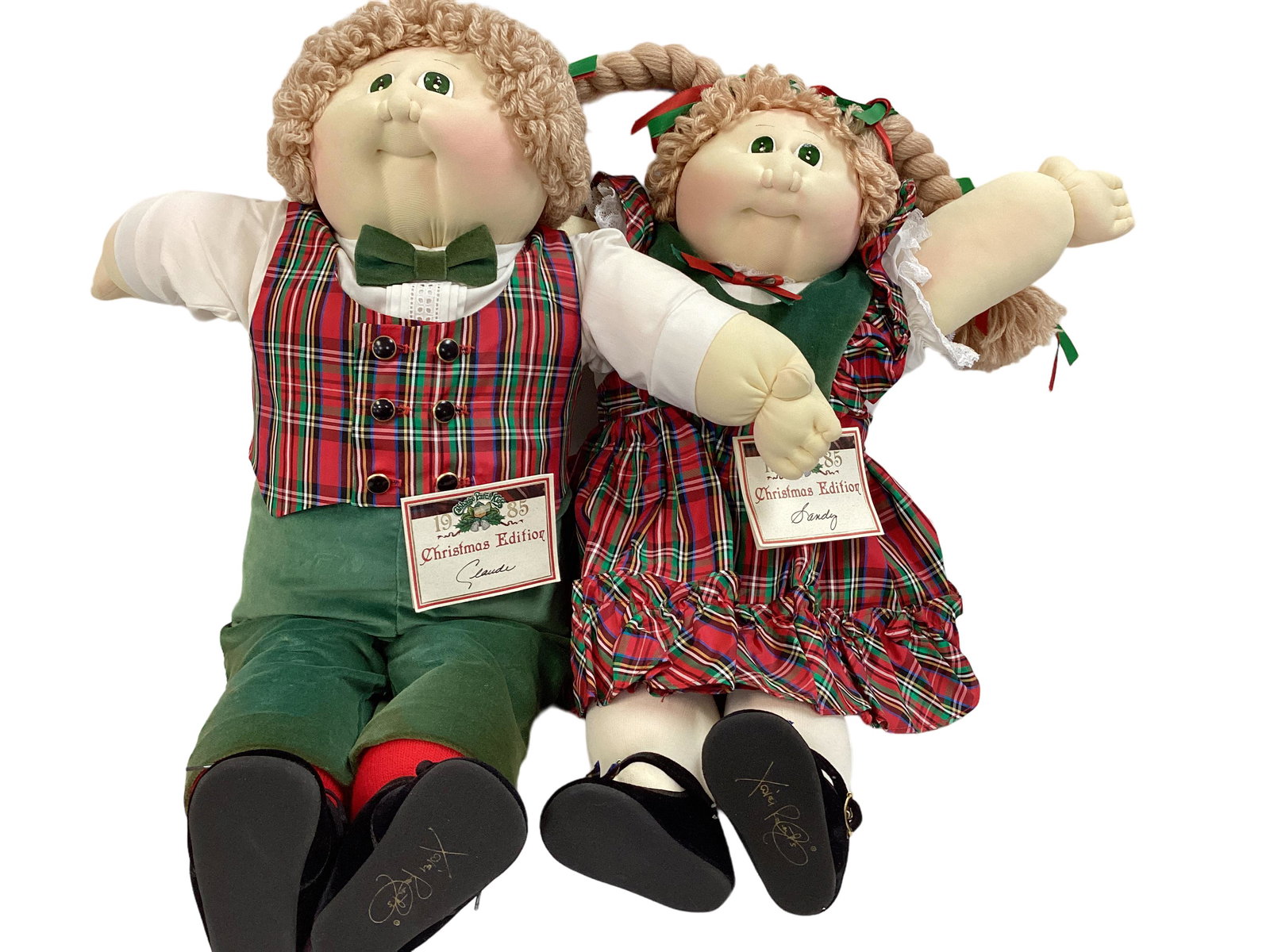 Set of two 1985 Christmas Edition Cabbage Patch Kids: Set of two 1985 Christmas Edition Cabbage Patch Kids Sandy is a 1985 Christmas Edition Cabbage Patch Kid by Original Appalachian Artworks, Inc complete with birth certificate and adoption papers. Clau