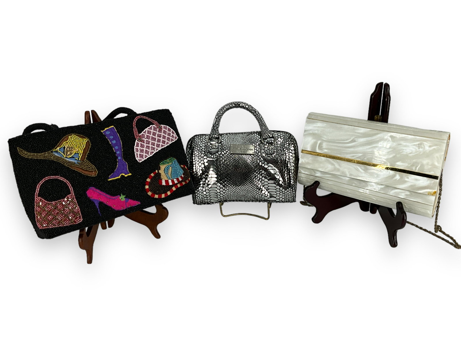 Lot Of Evening Hand Bags: Lot Of Evening Hand Bags 3 bags in total. Mother of pearl maker unknown 9.5îx5.5îx1.5î w/ 18.5î chain shoulder strap. Black seed bead bag ìfor Nikeî labeled inside 6.5