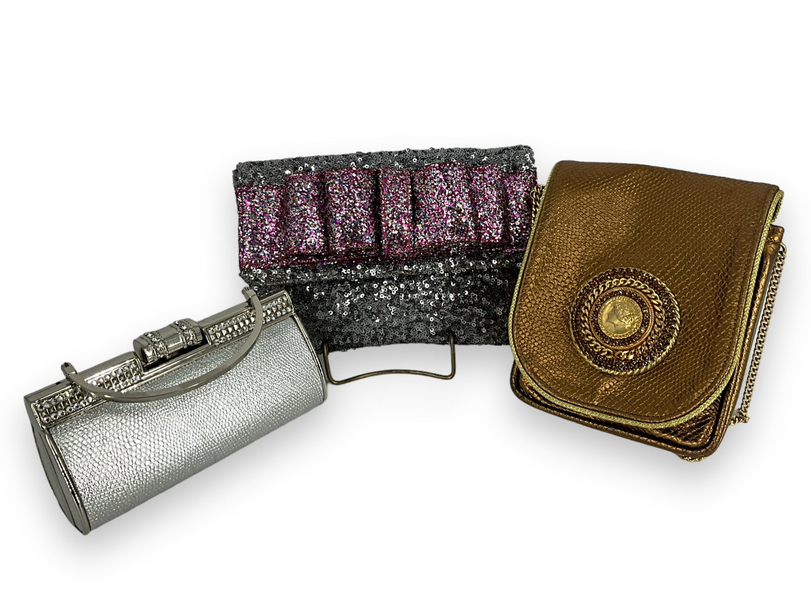 Lot Of Evening Hand Bags: Lot Of Evening Hand Bags Three bags in total. Silver sequence with large glittered bow by deux lux 6.25îx9î no strap. Gold bag by Salenaís Collection w/ crystals (missing a few) & gold 