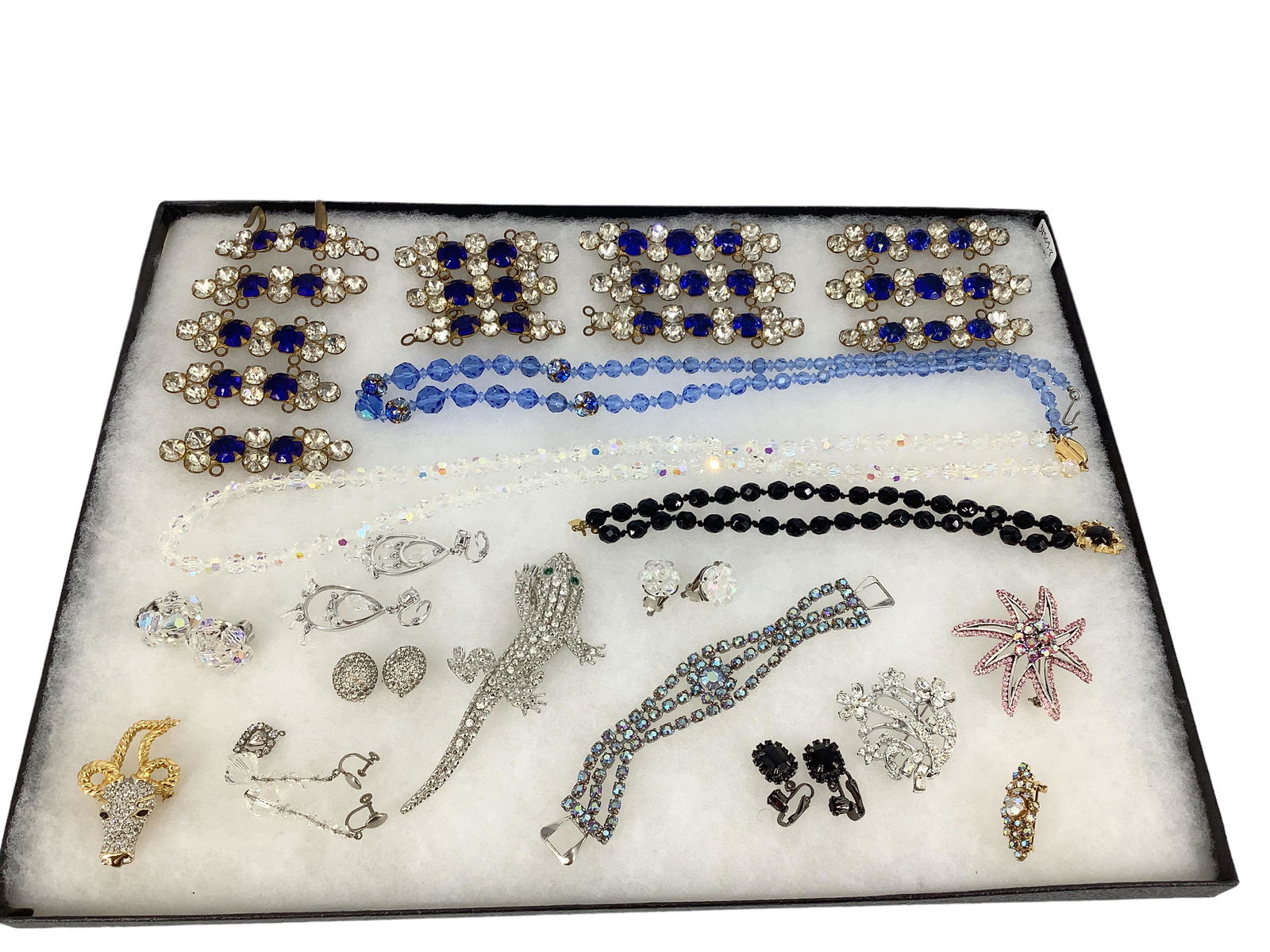 Unique & Sparkling Lot of Vintage and Modern Fashion Jewelry: Unique & Sparkling Lot of Vintage and Modern Fashion Jewelry Unusual antique French belt with alternating blue and clear crystal sections,14 in total, different lengths with old cut round stones in cl
