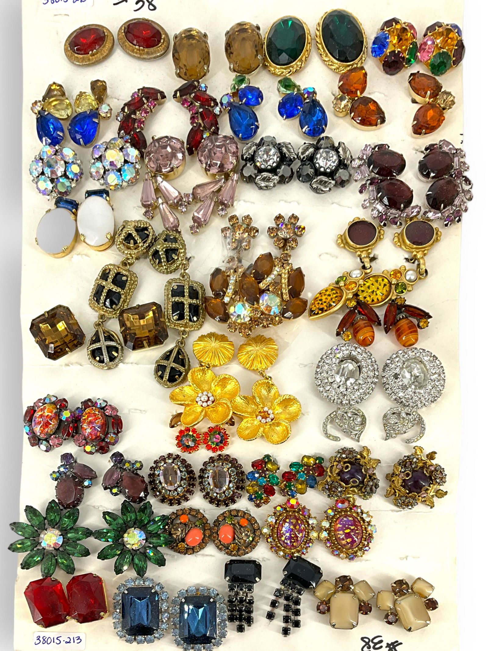Multiple Pairs Vintage Clip Earrings, Some Signed, #38: Multiple Pairs Vintage Clip Earrings, Some Signed, #38 Over 28 pairs of vintage costume clip back earrings, one signed Ã¬Warner,Ã® with dangle earrings (one has a loose piece), flower design earri