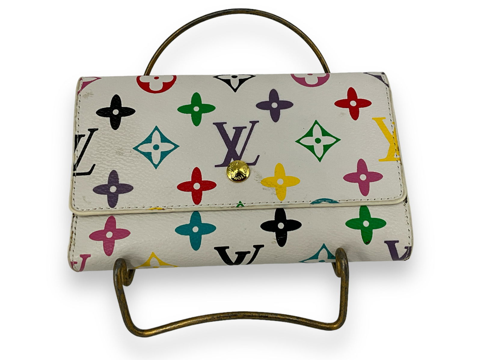 Loui Vuitton Style Wallet: Loui Vuitton Style Wallet White in color with pink, purple, green, blue & black Loui logo. In the style of Loui Vuitton. Comes with duster bag. Serial # M61203. 3.5îx5.75î closed. 9.75î