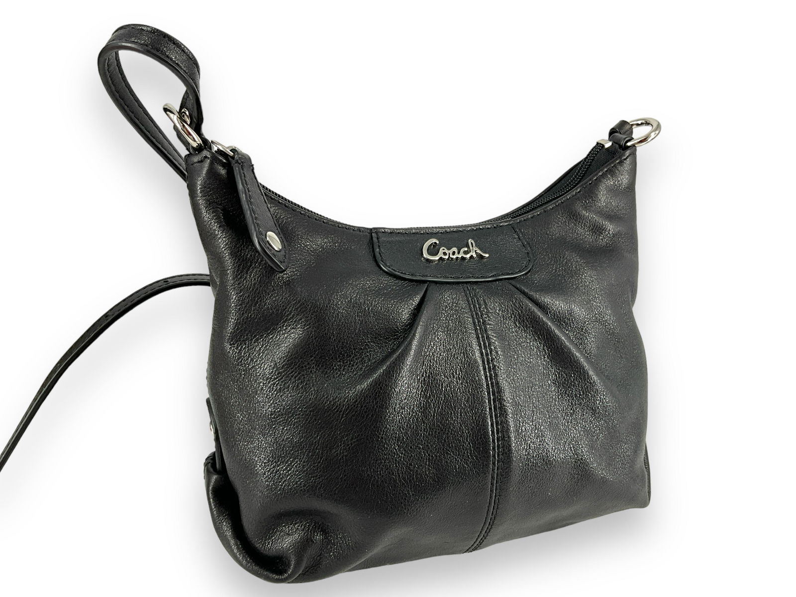 Vintage Coach Crossbody Handbag: Vintage Coach Crossbody Handbag Measuring approx. (8î x 3.5î x 7î) with a crossbody drop of (21î) black leather handbag with silver tone hardware and purple interior lining.