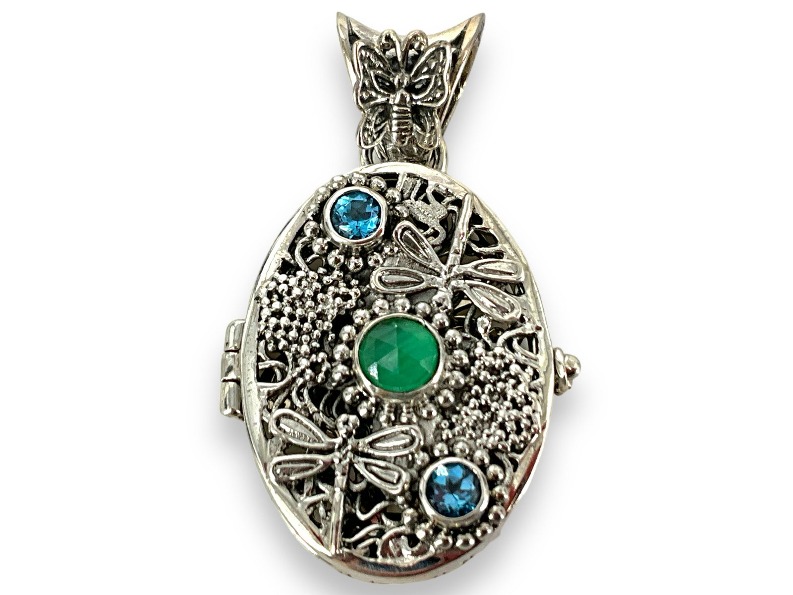 Sterling Silver Locket: Sterling Silver Locket Elegant natural design with dragonflies and a butterfly, openwork features with a hinged closure, accented with three bezel set gemstones (0.46 troy oz tw).