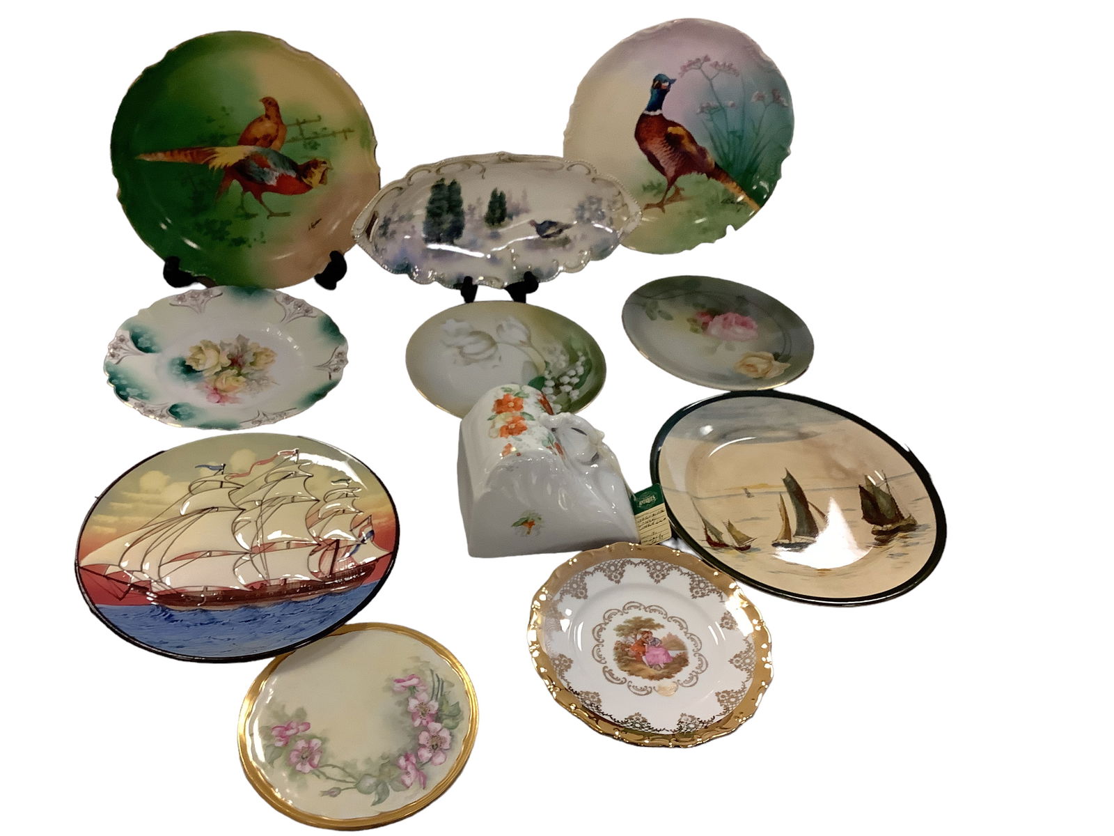 (11) Decorator Plates - Birds, Floral & Sailboats: (11) Decorator Plates - Birds, Floral & Sailboats Smallest is a floral trivet measuring 6.5î diameter, oblong turkey and trees measures 12î long and pheasant plates are 10î diameter. Al