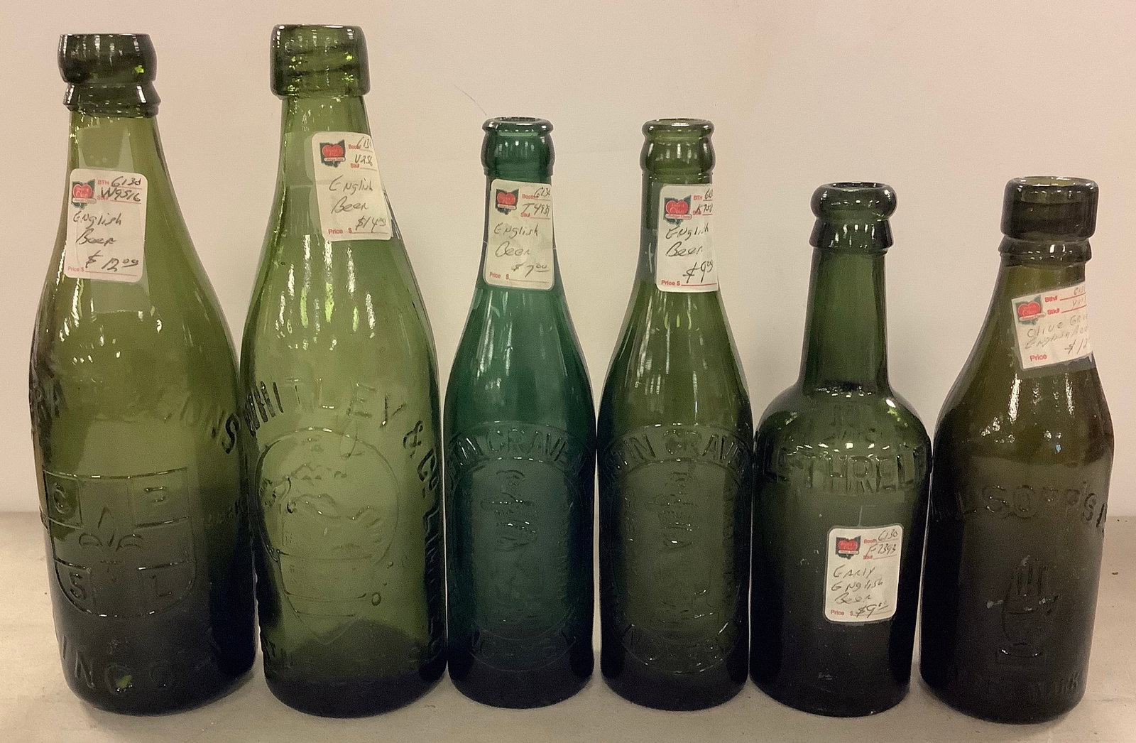 Vintage English Advertising Bottles: Vintage English Advertising Bottles Includes (6) bottles from Austin Craven Ltd, Creenall Whitley & Co, C.Pratt & Sons and more.