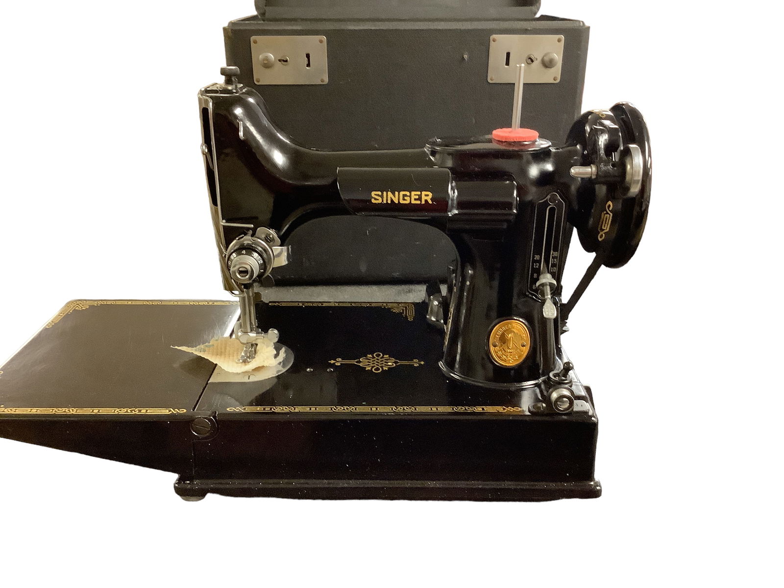 Singer Featherweight Sewing Machine: Singer Featherweight Sewing Machine 10î x 10î with attachments Case included. Foot pedal included. # on machine AH656603 Bobbin in office. (See Photos)