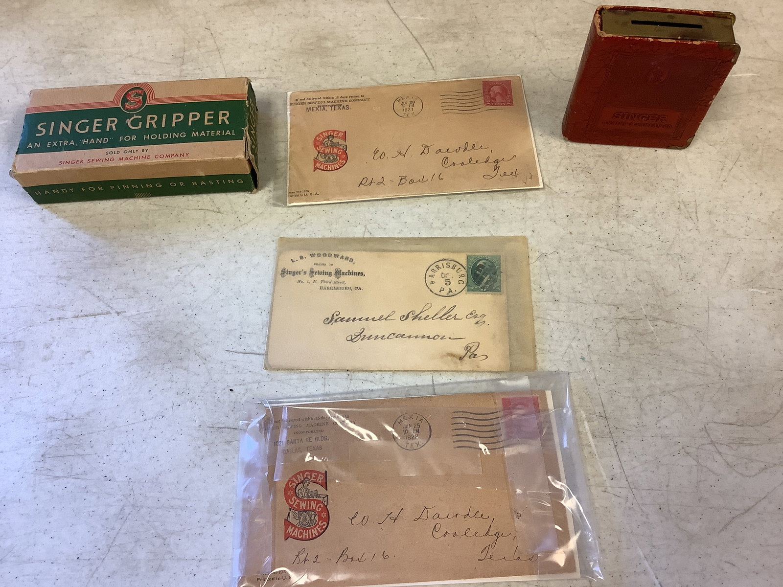 Singer Gripper and Bank with Address Envelopes (1 of 1)
