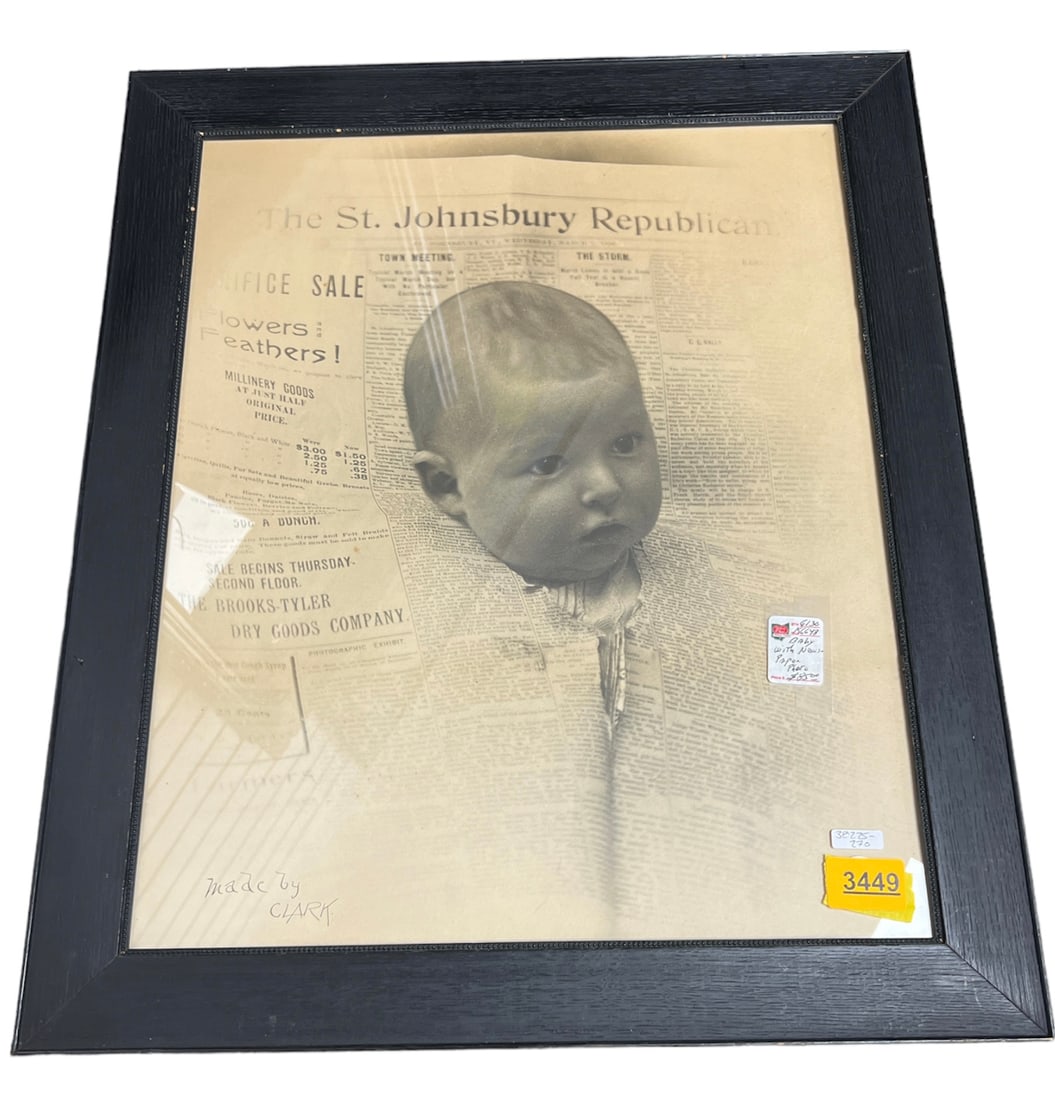 Framed Photo, Baby With Newspaper: Framed Photo, Baby With Newspaper Made by Clark. 19.5î x 23.5î overall.