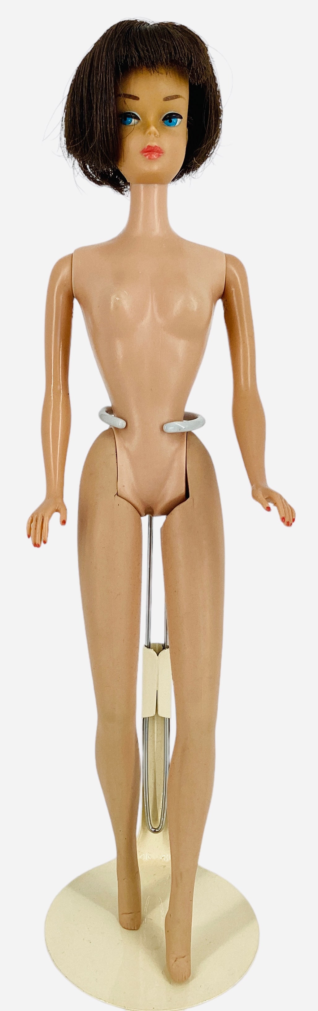 AMERICAN GIRL BARBIE: AMERICAN GIRL BARBIE American Girl Barbie with beautiful brunette hair & excellant makeup, nails painted and no green ear. One leg and arms are loose, 1 leg clicks 3 times & the other 2 times, scratch