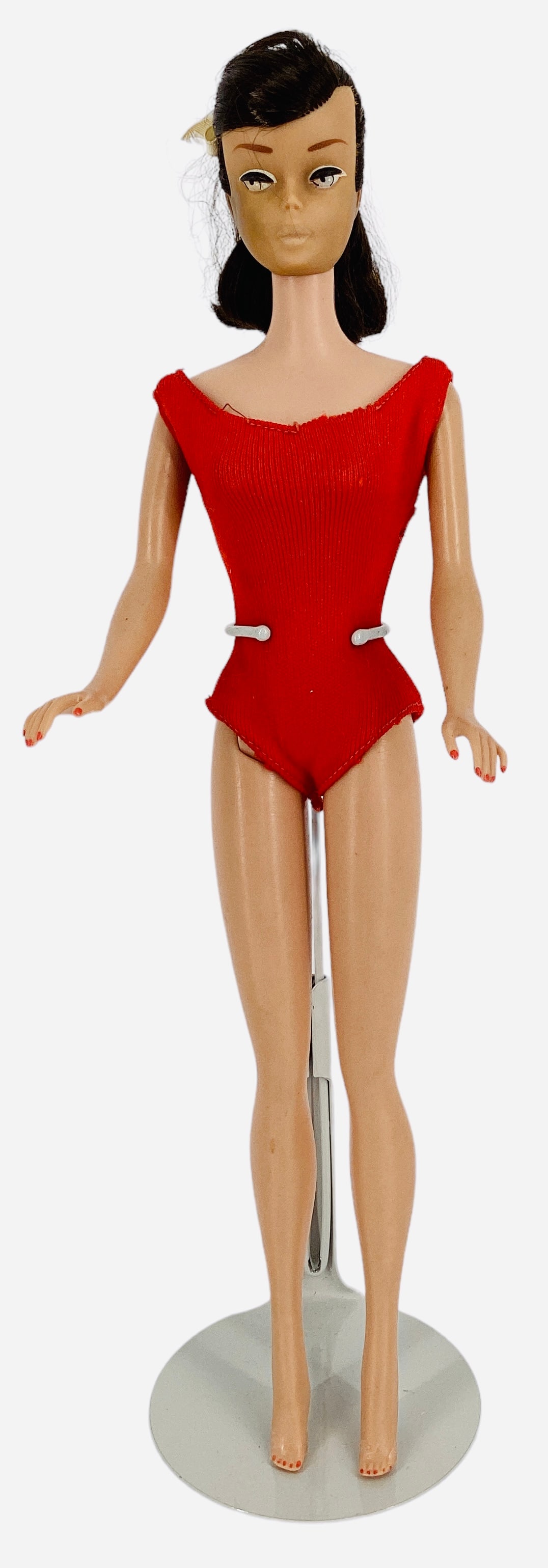 SWIRL PONYTAIL BARBIE: SWIRL PONYTAIL BARBIE Swirl brunette Ponytail Barbie that has been trimmed & new ponytail w/ white bow, all nails present w/ no bites and painted, lips faded. Swimsuit in fair condition.
