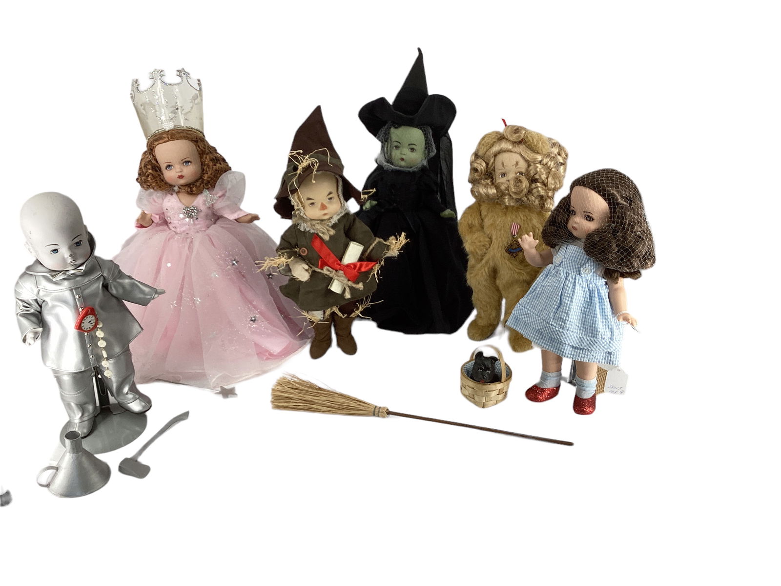 Effanbee Patsy "Wizard of OZ" Dolls: Effanbee Patsy "Wizard of OZ" Dolls Lot of 6. 13" hard vinyl dolls include Dorothy (with Toto), Glinda, Scarecrow, Tin Man, Lion and the Witch. Each has a synthetic wig (excluding Tin Man), molded and