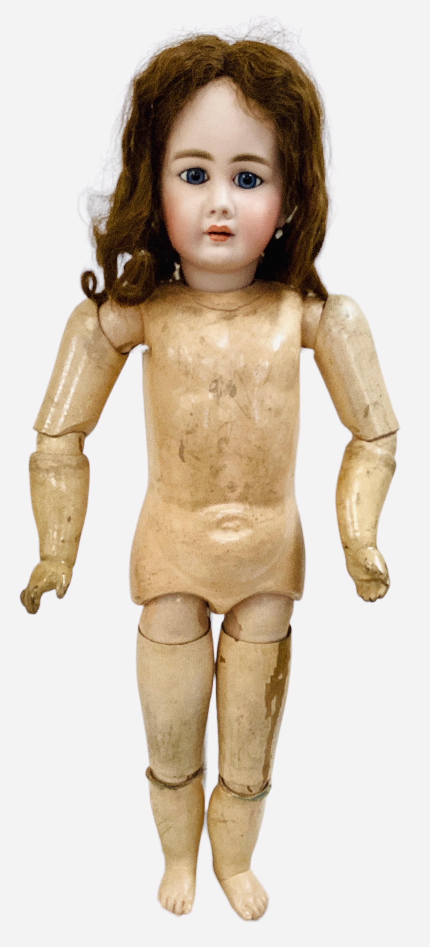 Simon & Halbig 939 bisque socket head child.: Simon & Halbig 939 bisque socket head child. 29" doll with original human hair wig, stationary glass eyes, applied pierced ears, open mouth with teeth, on French-type wood and composition body stamped