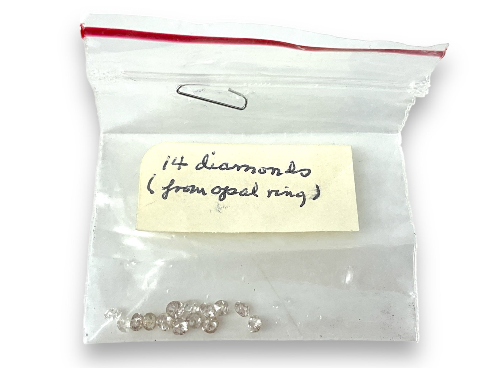 Fourteen Small Loose Melee Diamonds: Fourteen Small Loose Melee Diamonds Fourteen diamonds averaging 2.3mm (approx .70 points), one has a chip, some I1 clarity, ìJ-Kî color.