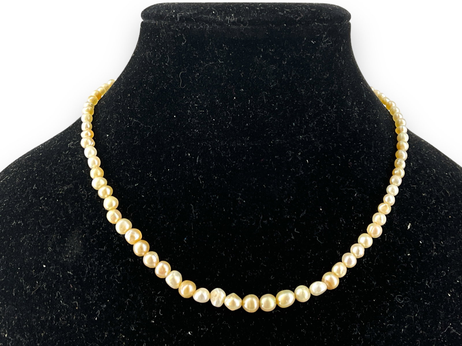 24k Yellow Gold and Pearl Necklace: 24k Yellow Gold and Pearl Necklace Pearl strand has a tested 24k clasp (no hallmarks seen) and is 14î long. Creamy color strand has graduated baroque pearls from 3.7 to 4.3mm, weighs 9.74 grams.