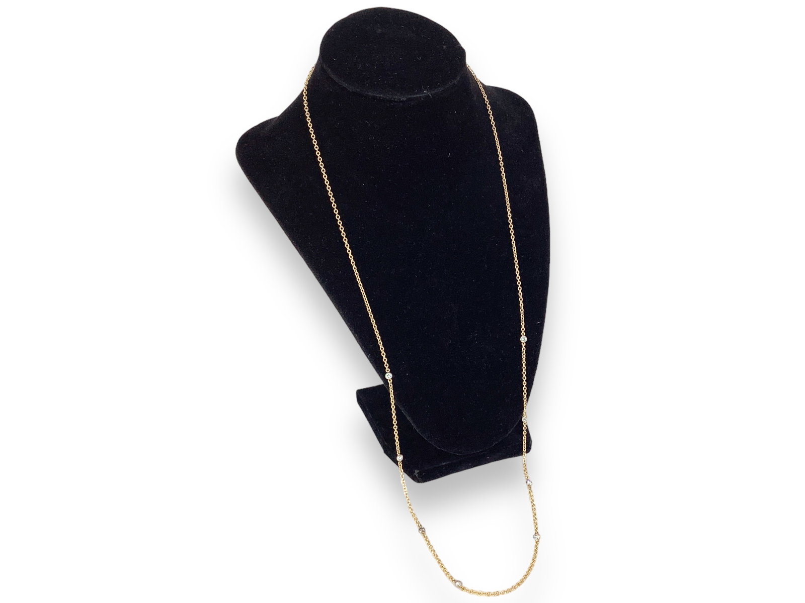 14k ìDiamonds by the Yardî Chain: 14k ìDiamonds by the Yardî Chain Necklace is marked ì14kî and tested gold, is approx 30î long and has 8 bezel-set diamond stations with each diamond measuring approx 3mm (.80 