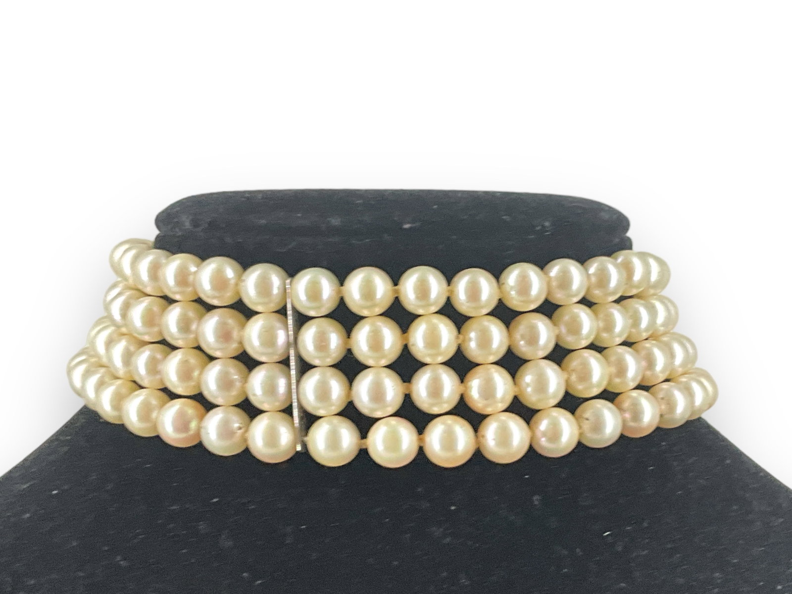 Four-Strand Akoya Pearl Choker: Four-Strand Akoya Pearl Choker Four-strand Akoya pearl choker is is approx 12î long, has a tested 14k white-gold slide closure (and space-bars), has approx 7mm pearls with rose hue, could use a t